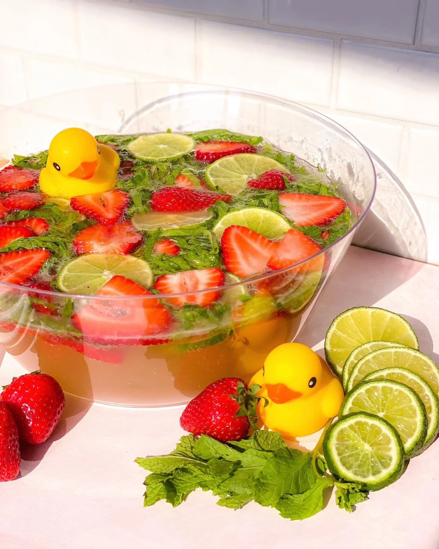 Strawberry Mint Mocktail brings fun bar vibes into your home🍓 This sharable strawberry mint mocktail is packed with ginger beer, fresh lime juice, and topped with a festive rubber ducky (optional, however strongly recommended). The best part &mdash;