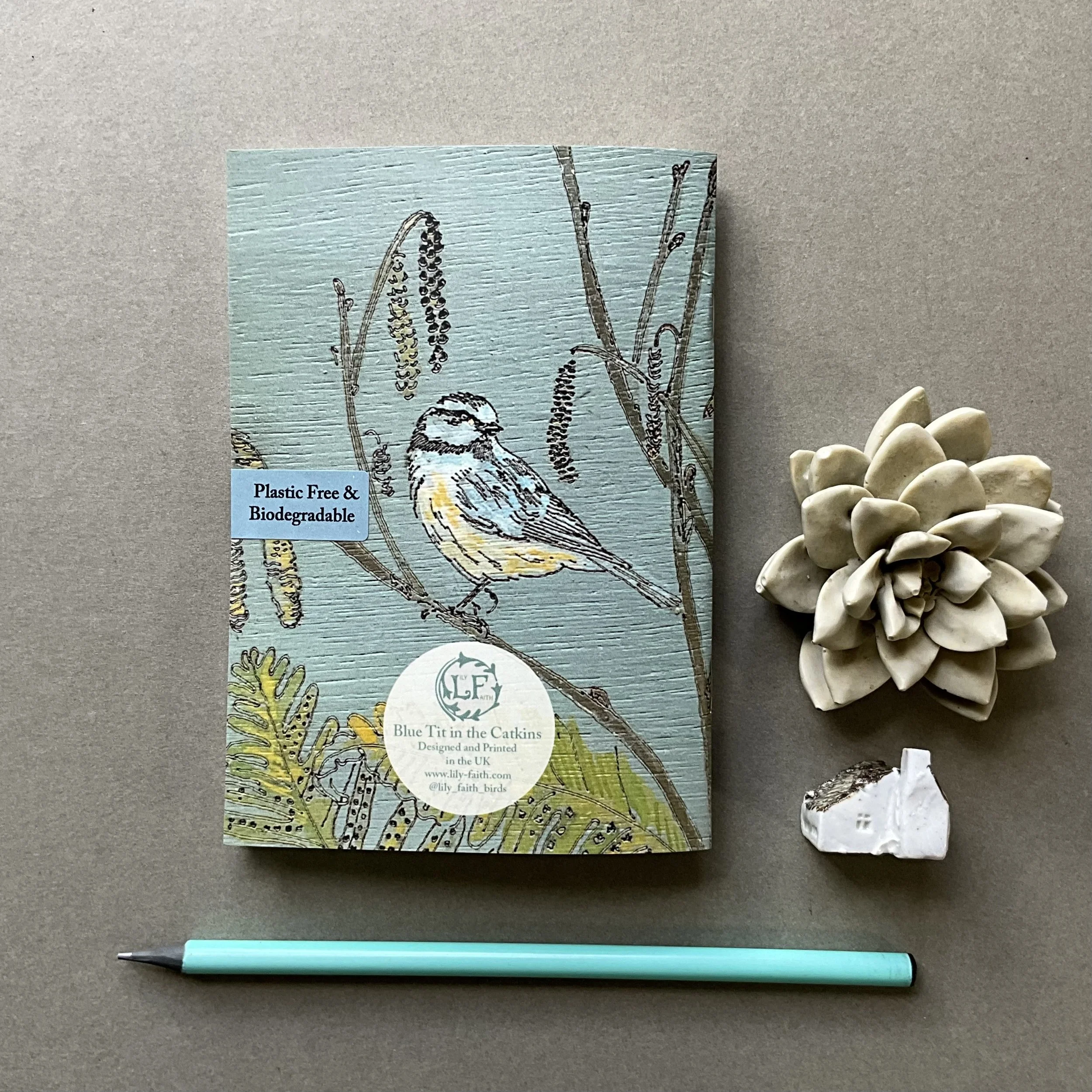 46 paged A6 notebook with a Lily Faith Blue Tit illustration on the front and back.