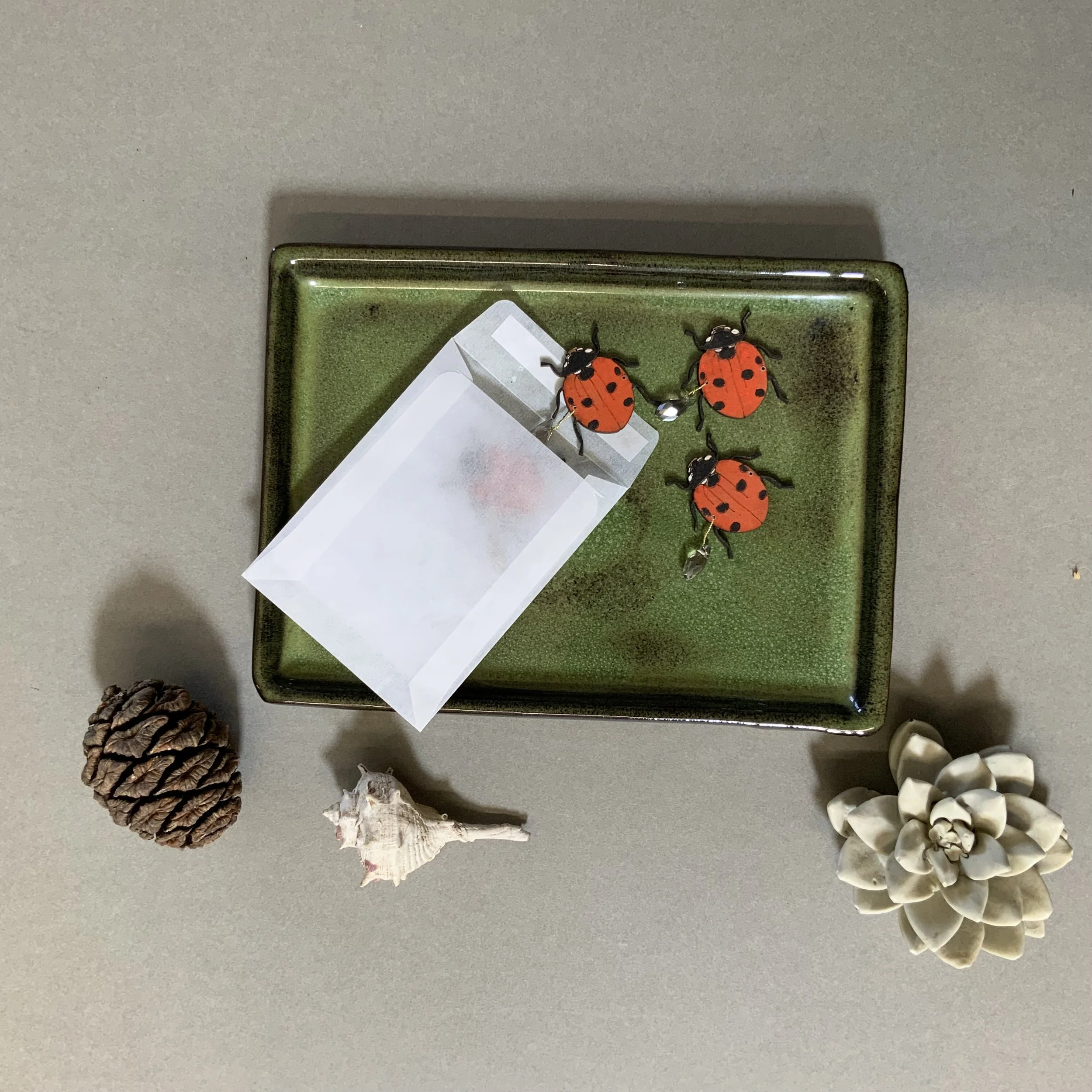 hand painted lady bird candle carousel pieces, laser cut and etched from FSC MDF in our Devon studio.