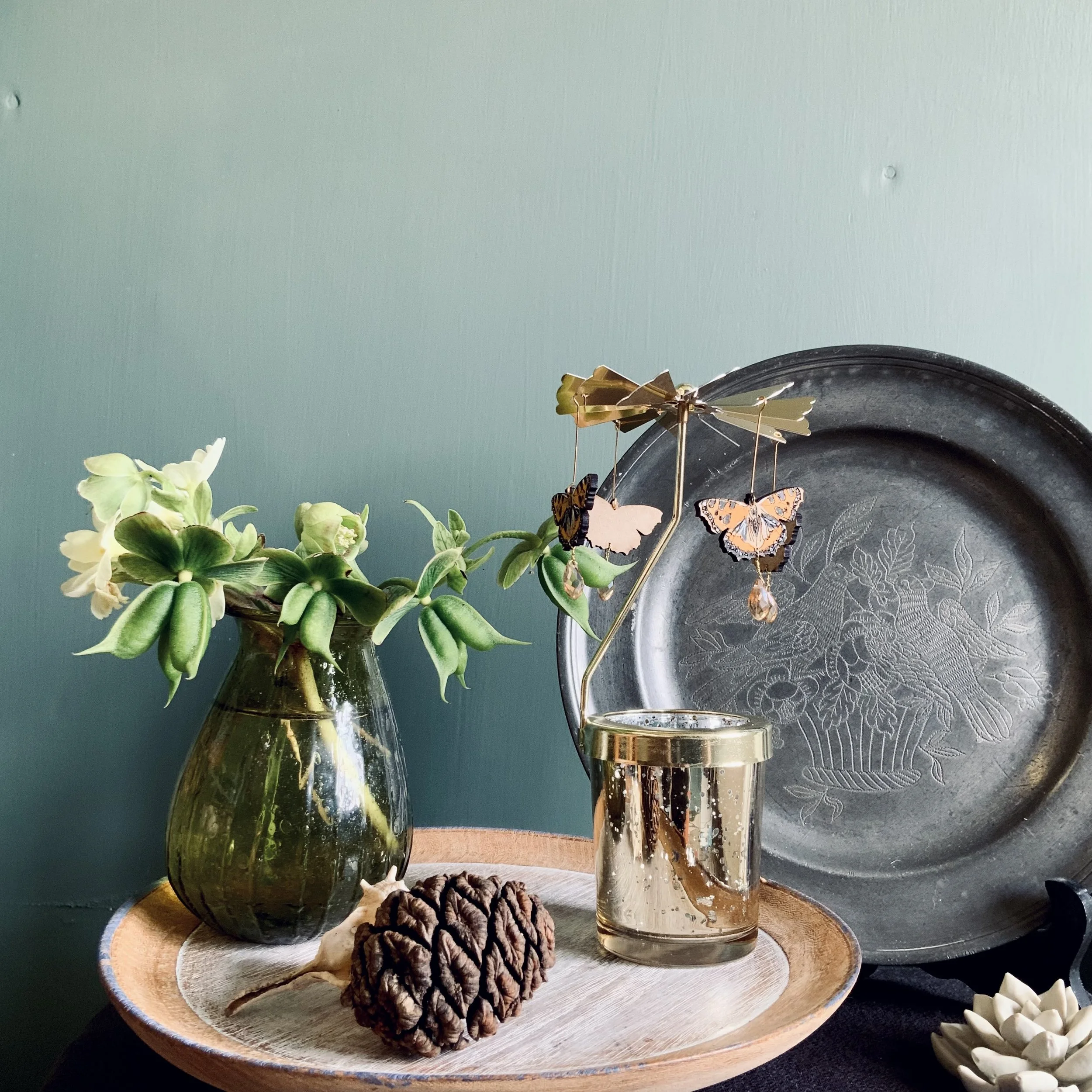 The Hand painted MDF wooden butterflies are elegantly suspended from a brass propeller, which sits above a glass votive with a tealight candle. (Copy)