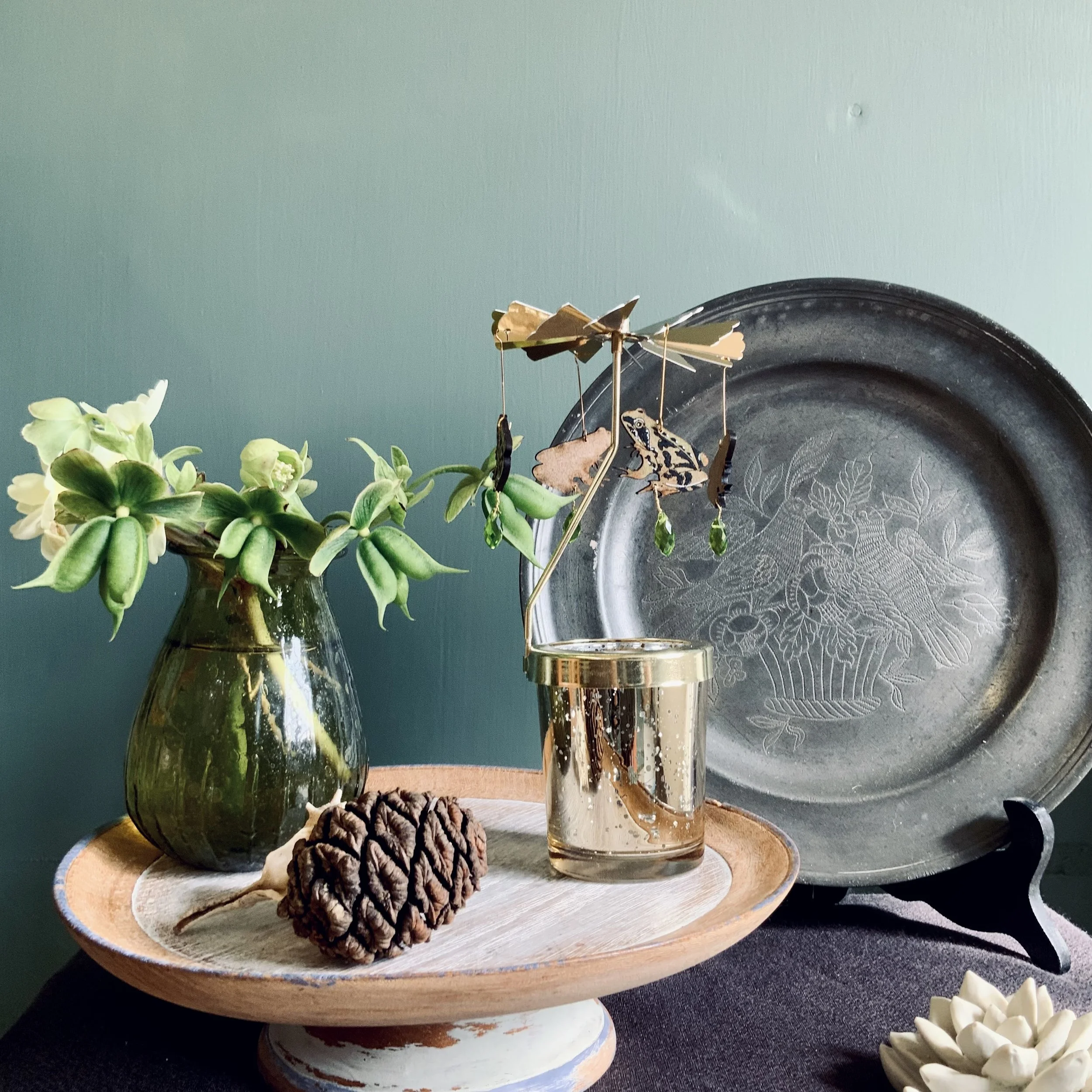 Lustrous Olive Green, hand painted laser cut frogs elegantly hang from the candle carousels brass propeller. (Copy)