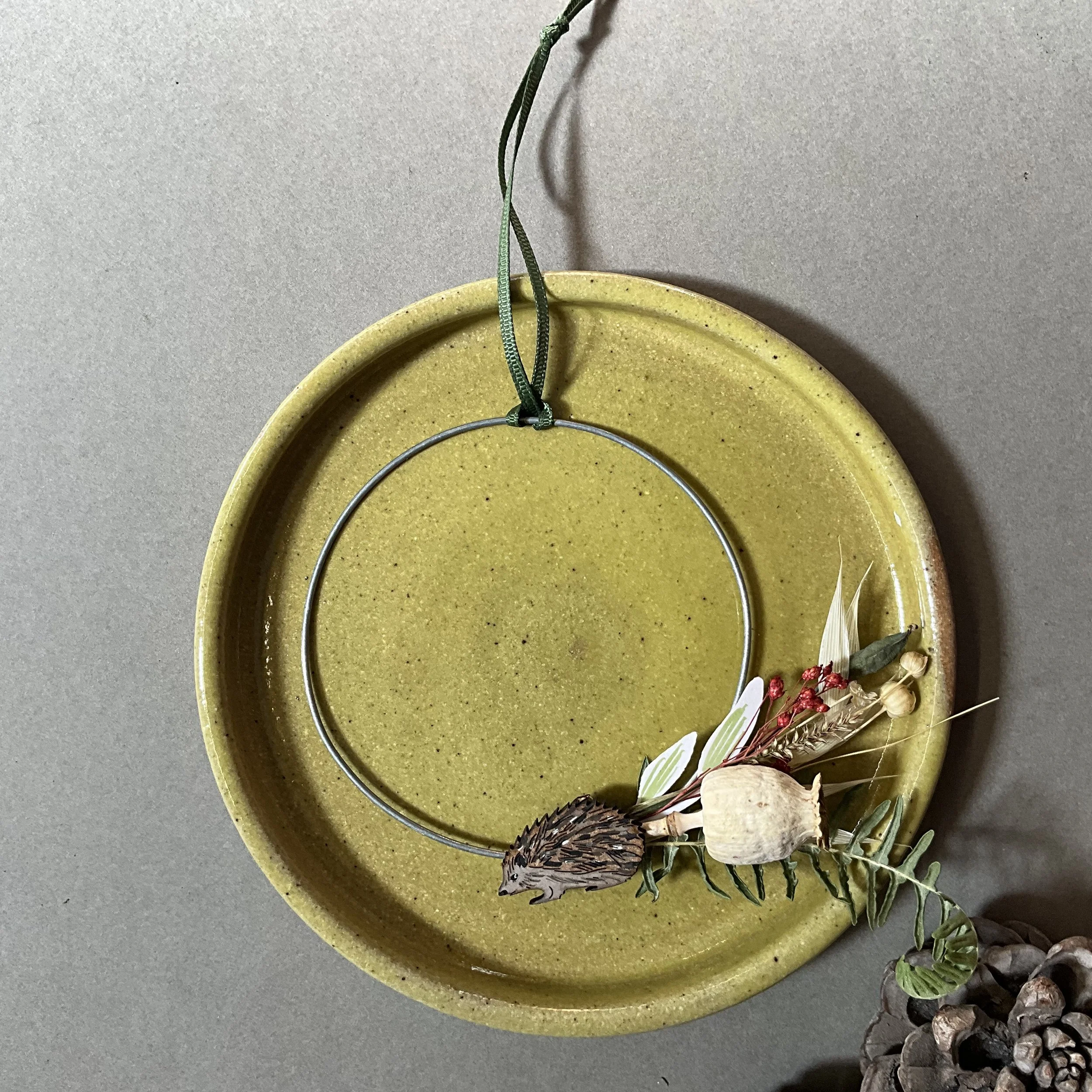 A handcrafted dried foliage wreath with a hedgehog embellishment the perfect gift for hedgehog lovers. (Copy)