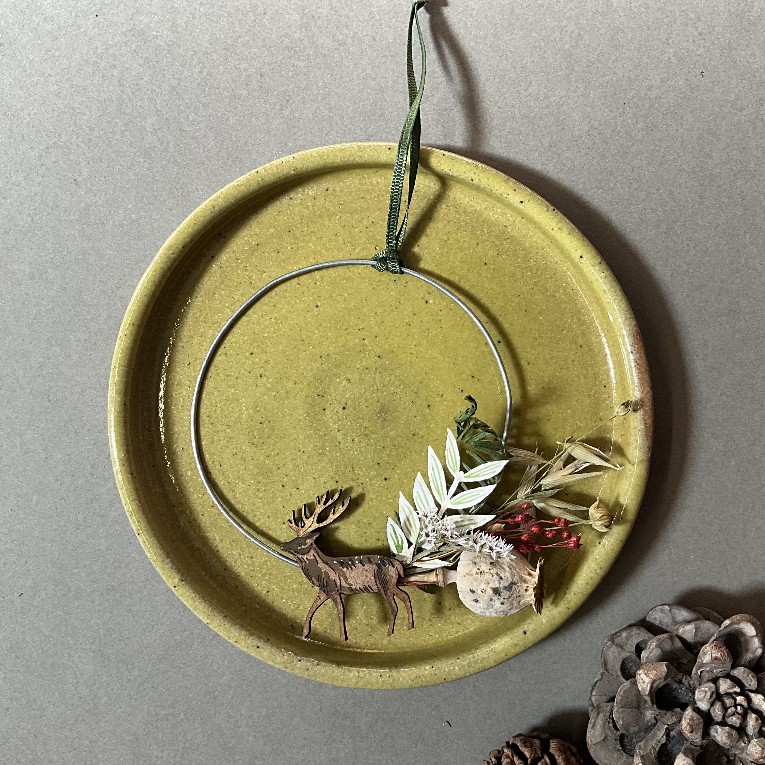 A dried foliage wreath featuring Lily Faith's laser engraved stag decoration. Made from sustainable materials in our Mid Devon studio. (Copy)