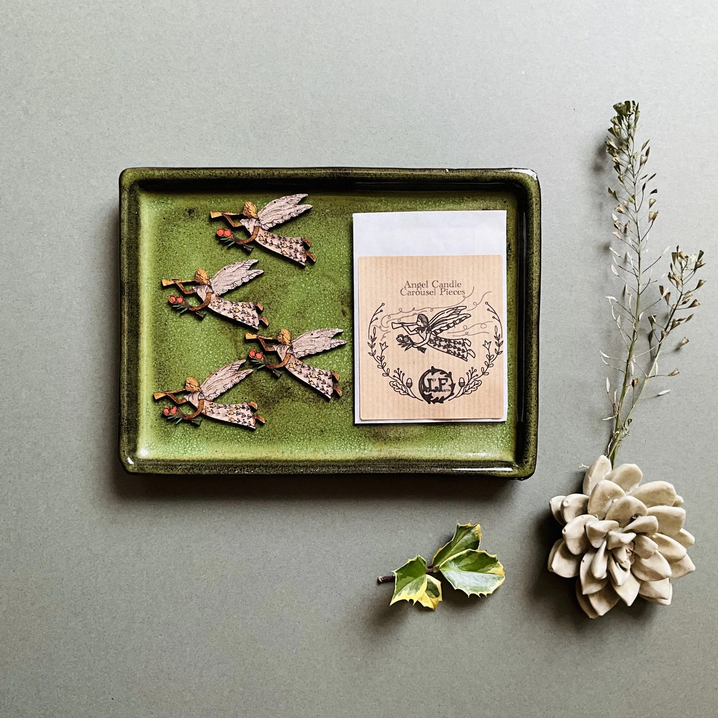 The perfect additional gift for the candle carousel lover in your life, these Angels bring pieces are presented in a glassine envelope featuring Lily’s hand drawn angel illustration