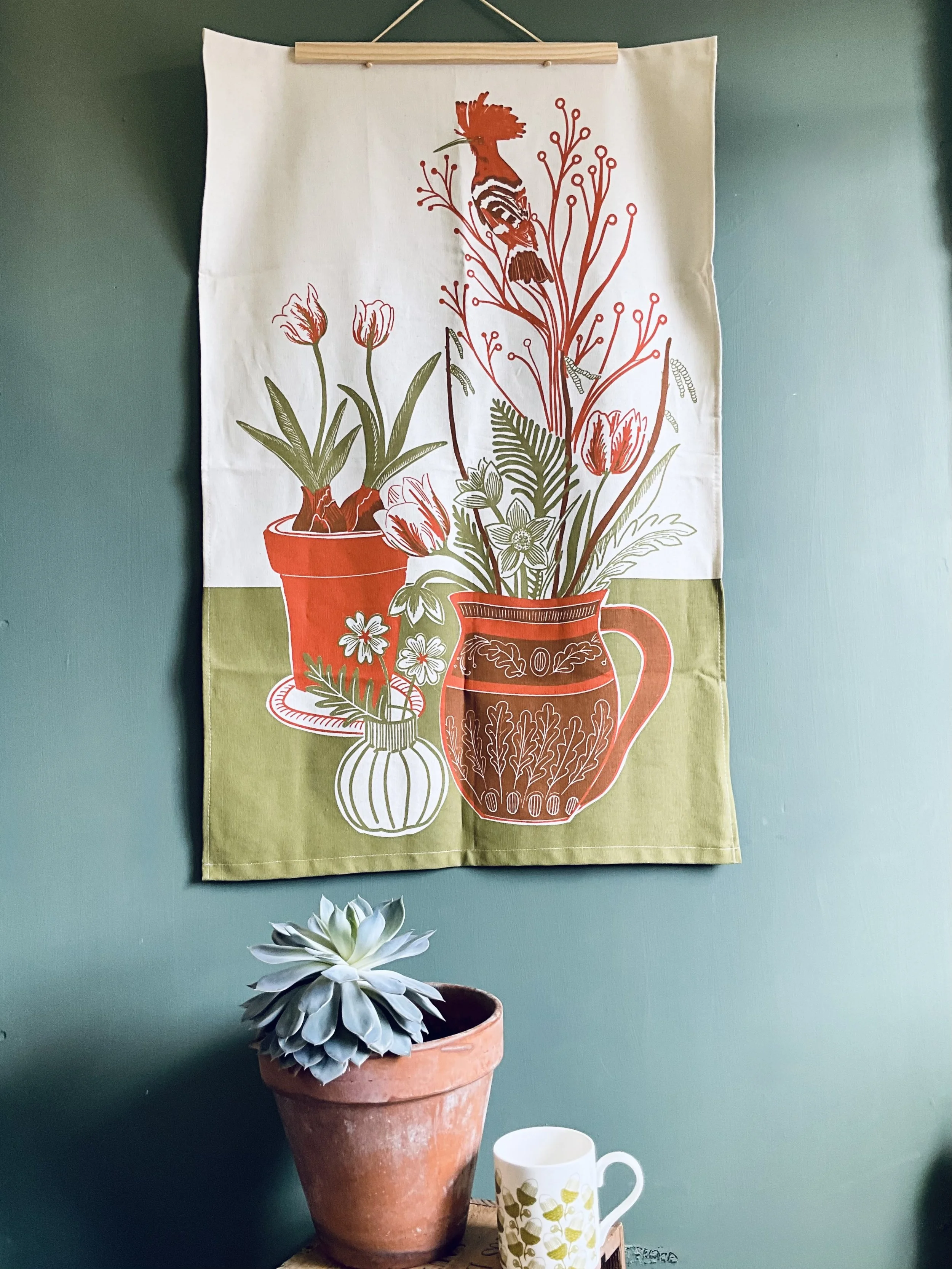 Lily Faith Tulips and a Hoopoe tea Towel, our latest foray into homewares featuring Lily's hand drawn two colour print design