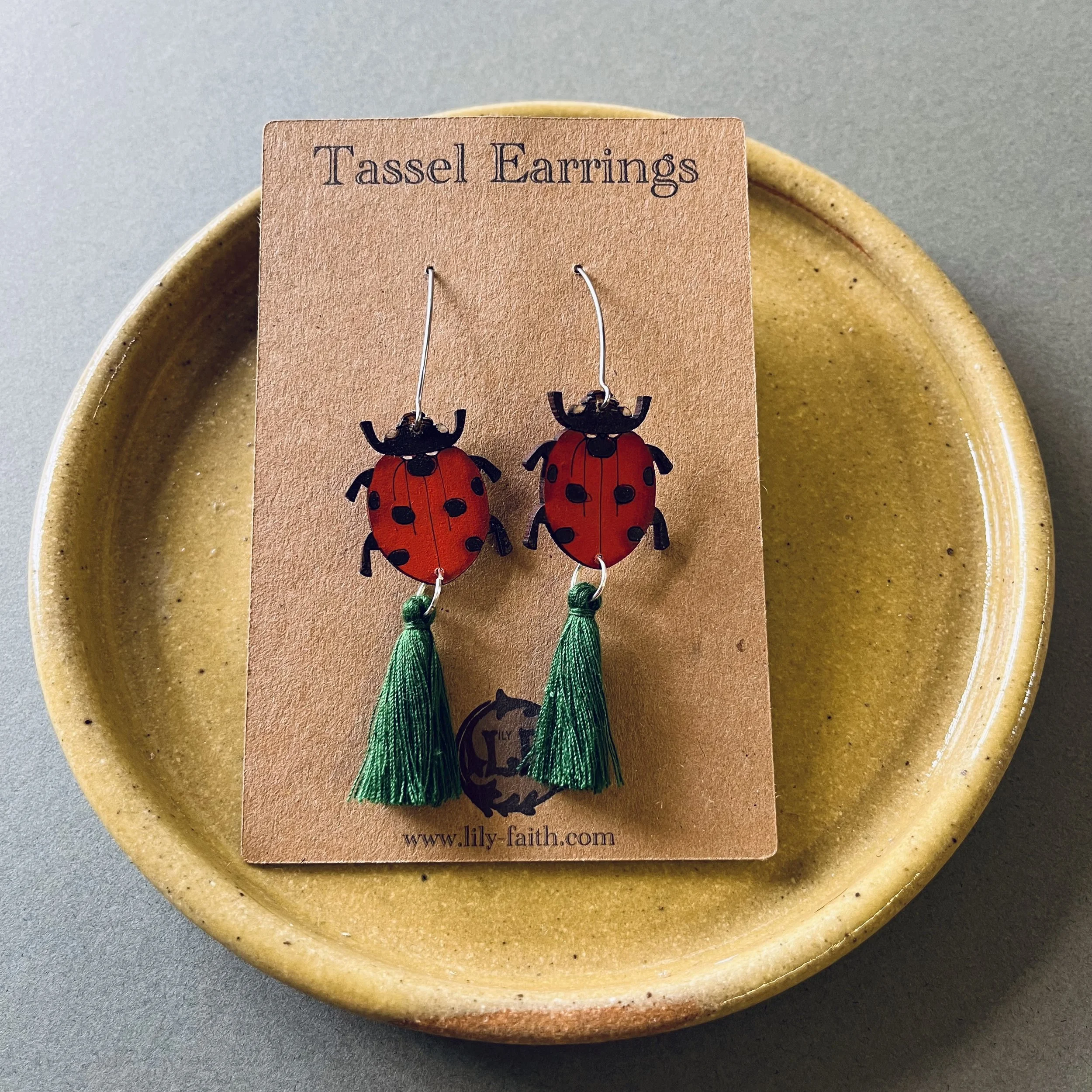 Ladybird Tassel earrings with bottle green tassels