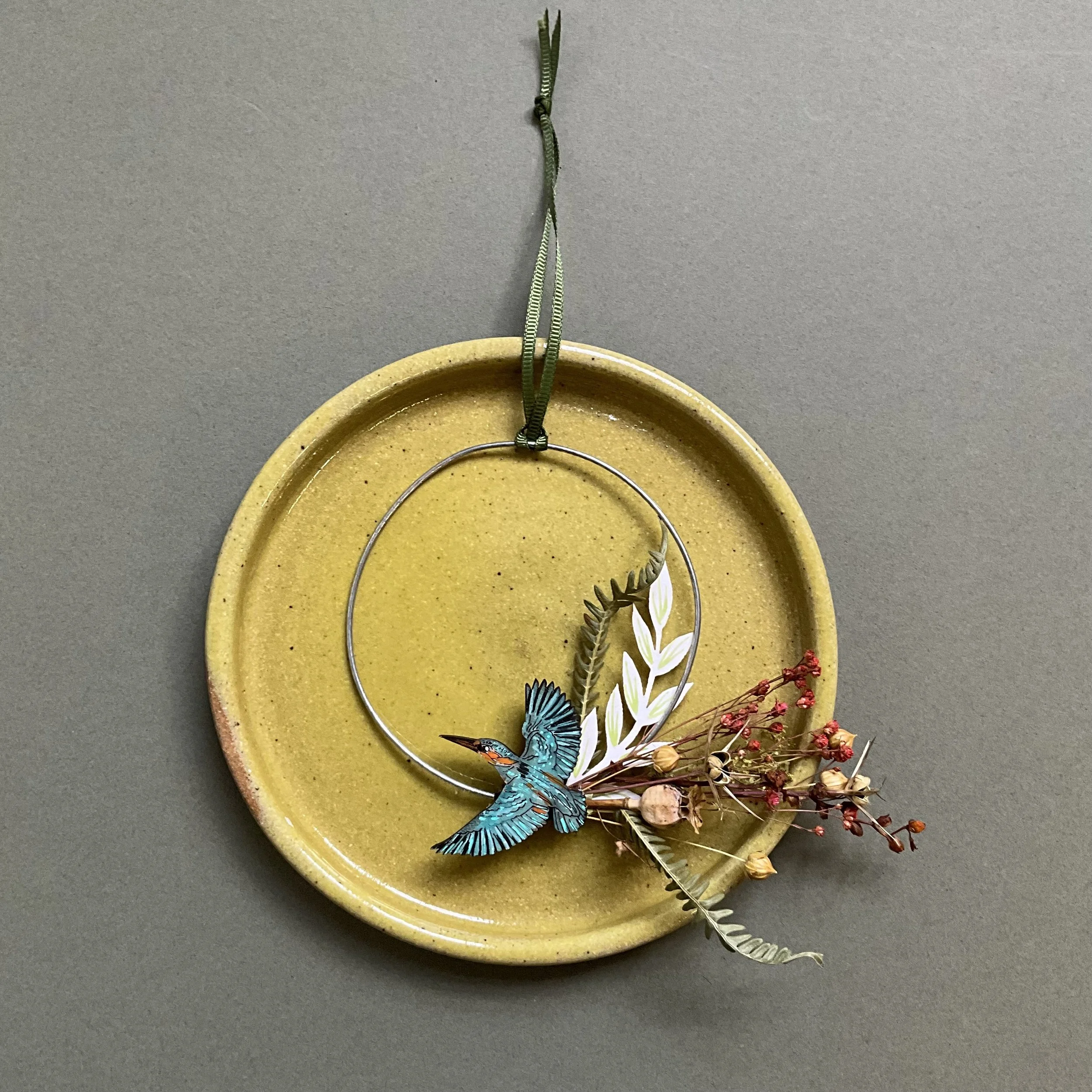 Kingfisher dried foliage wreath flat lay
