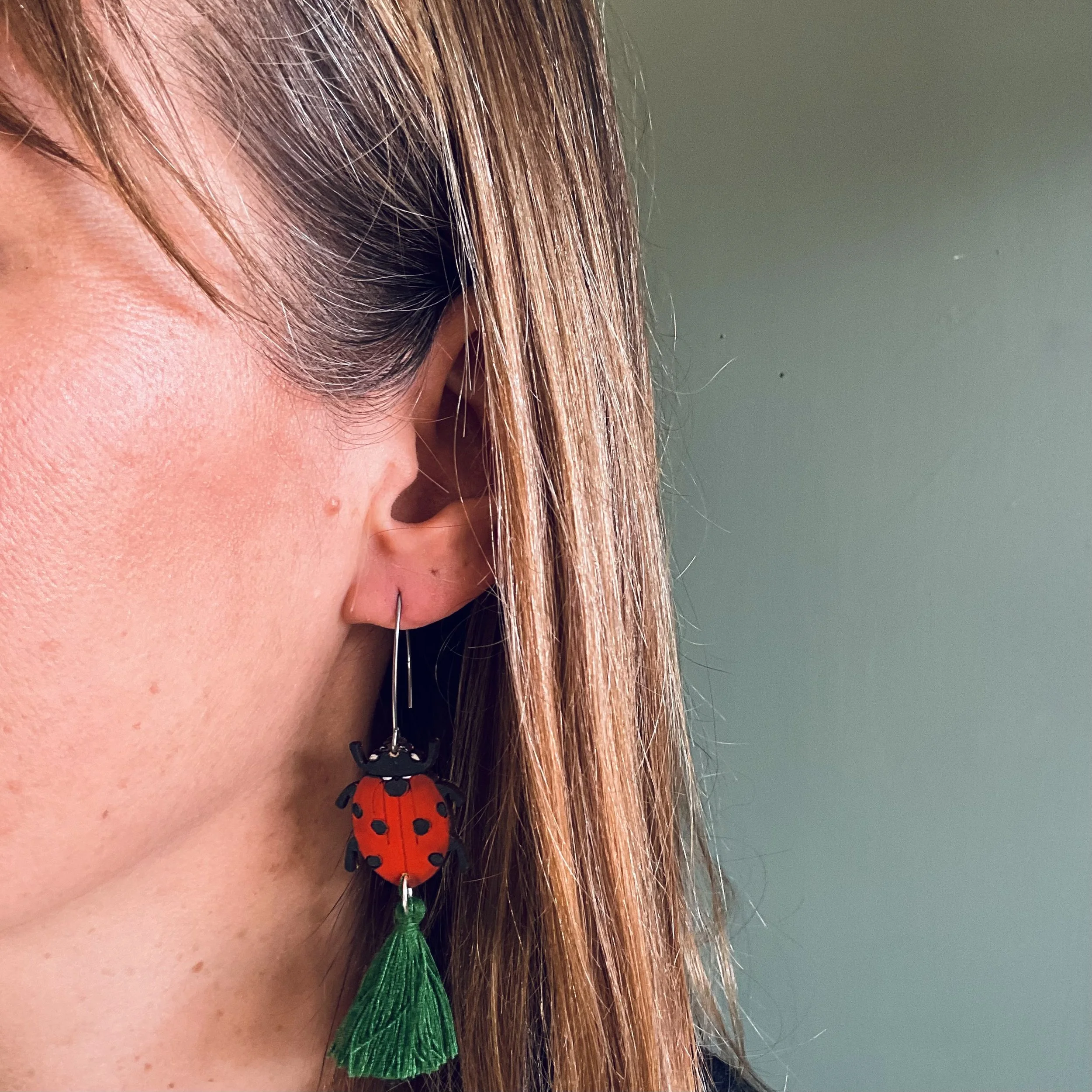 Ladybird Tassel earrings with bottle green tassels