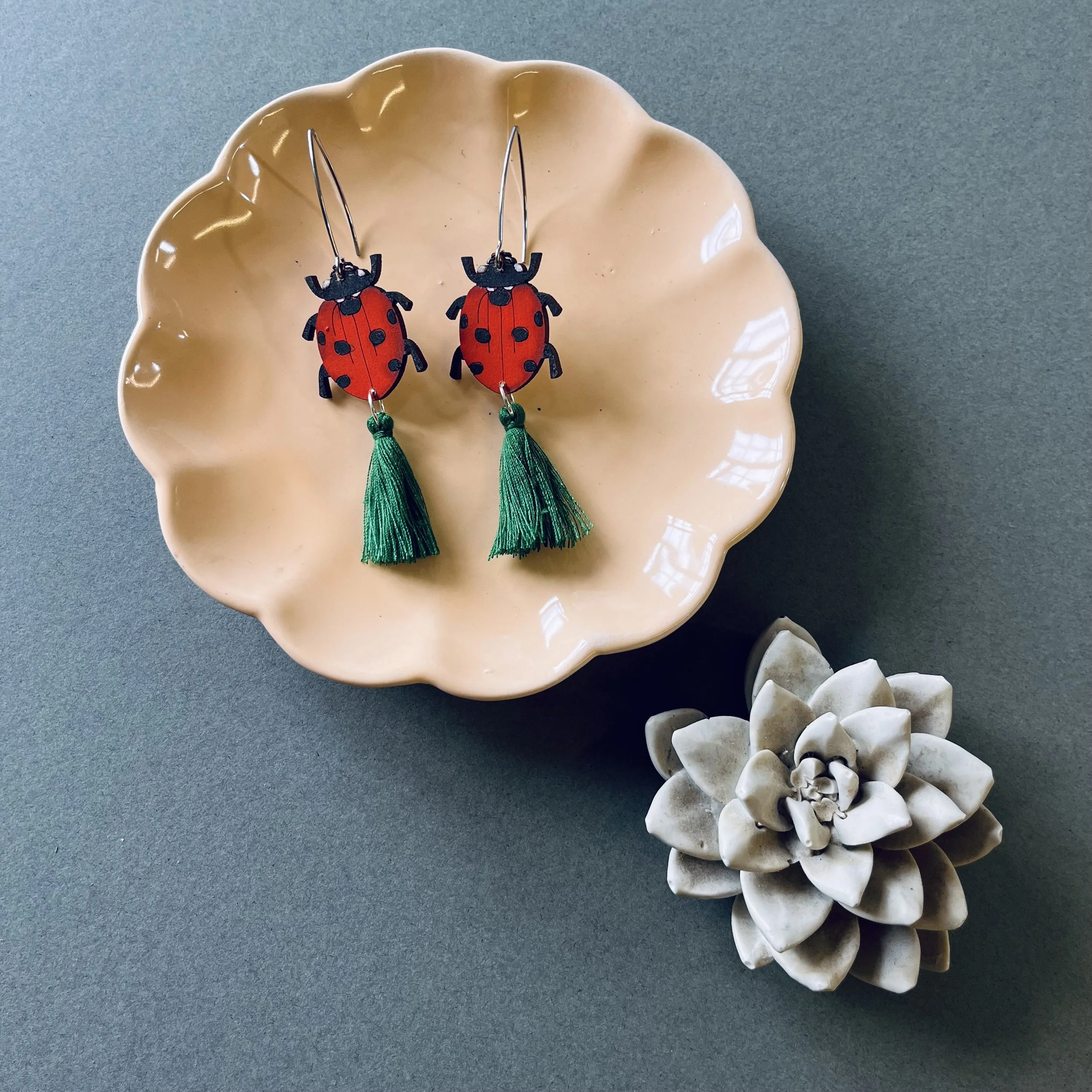 Ladybird Tassel earrings with bottle green tassels