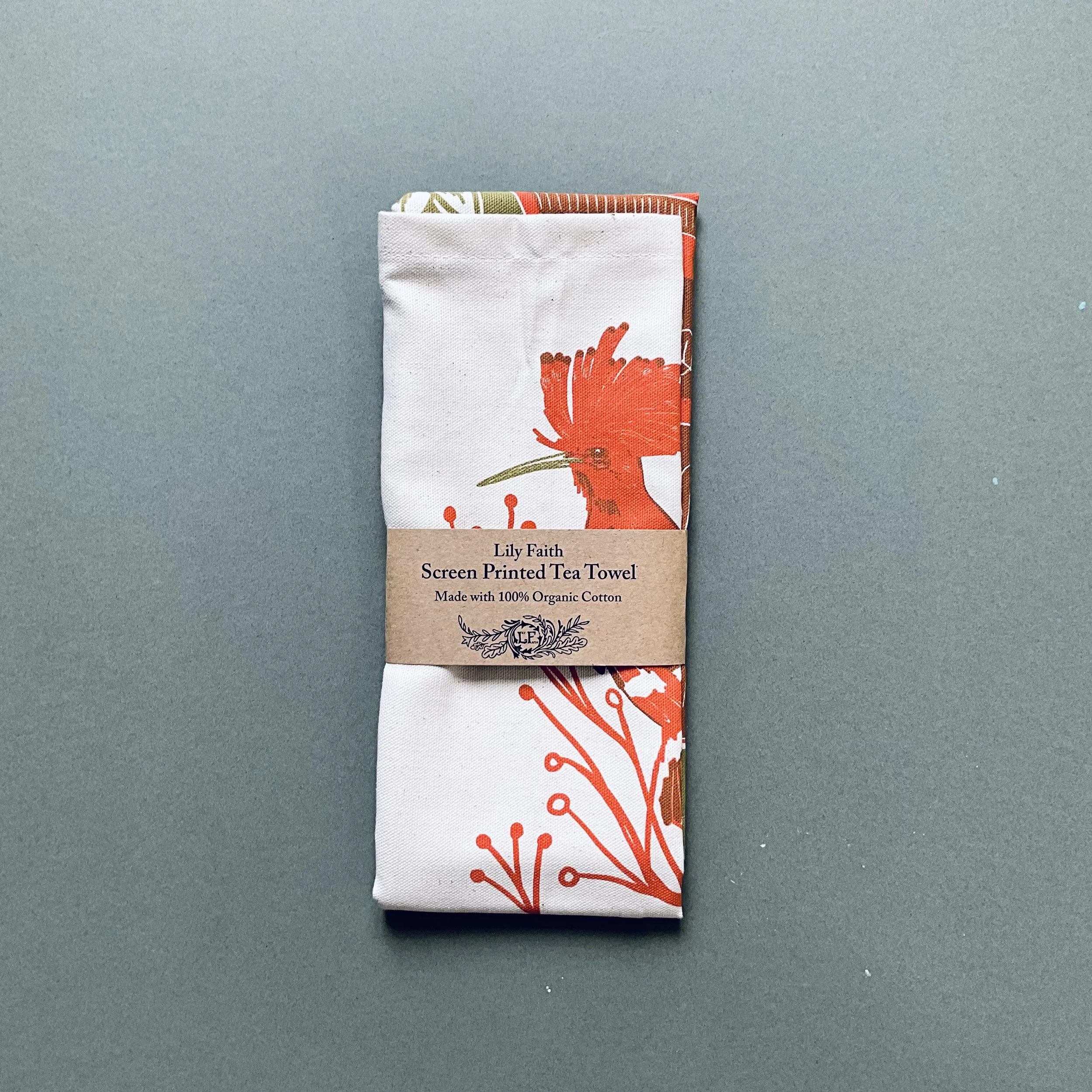 Lily Faith Tulips and a Hoopoe tea Towel, folded and banded with a recycled Kraft belly band