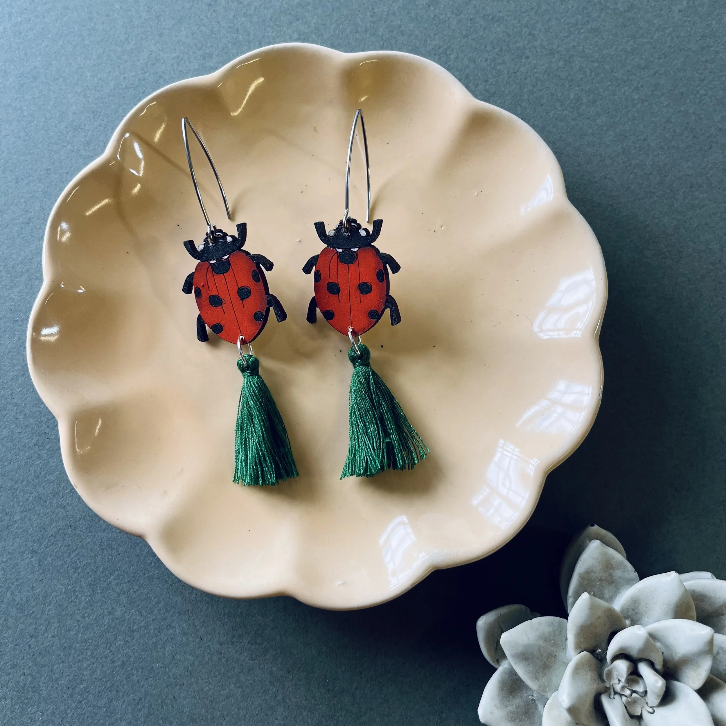 Ladybird Tassel earrings with bottle green tassels