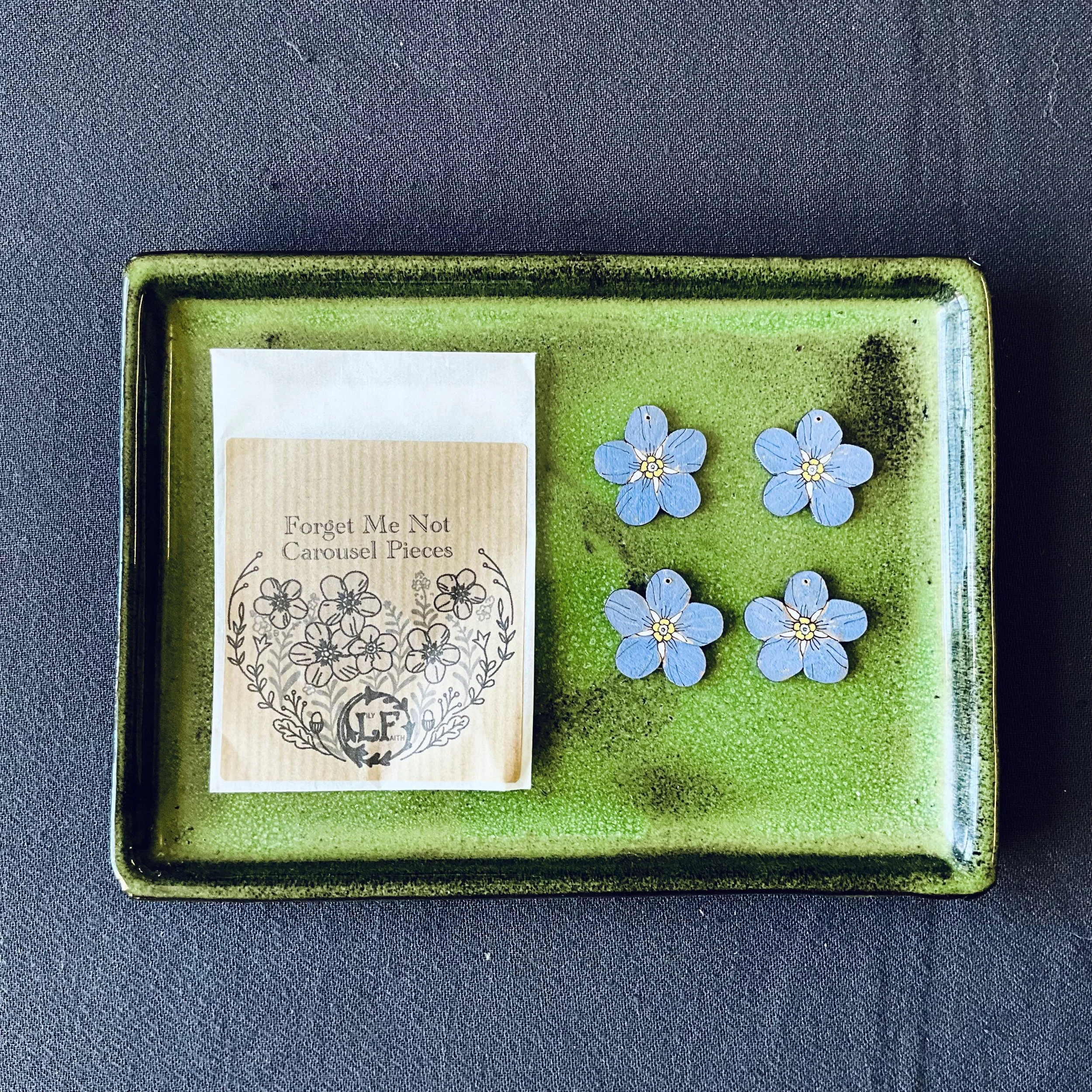 forget me not candle carousel.jpeg