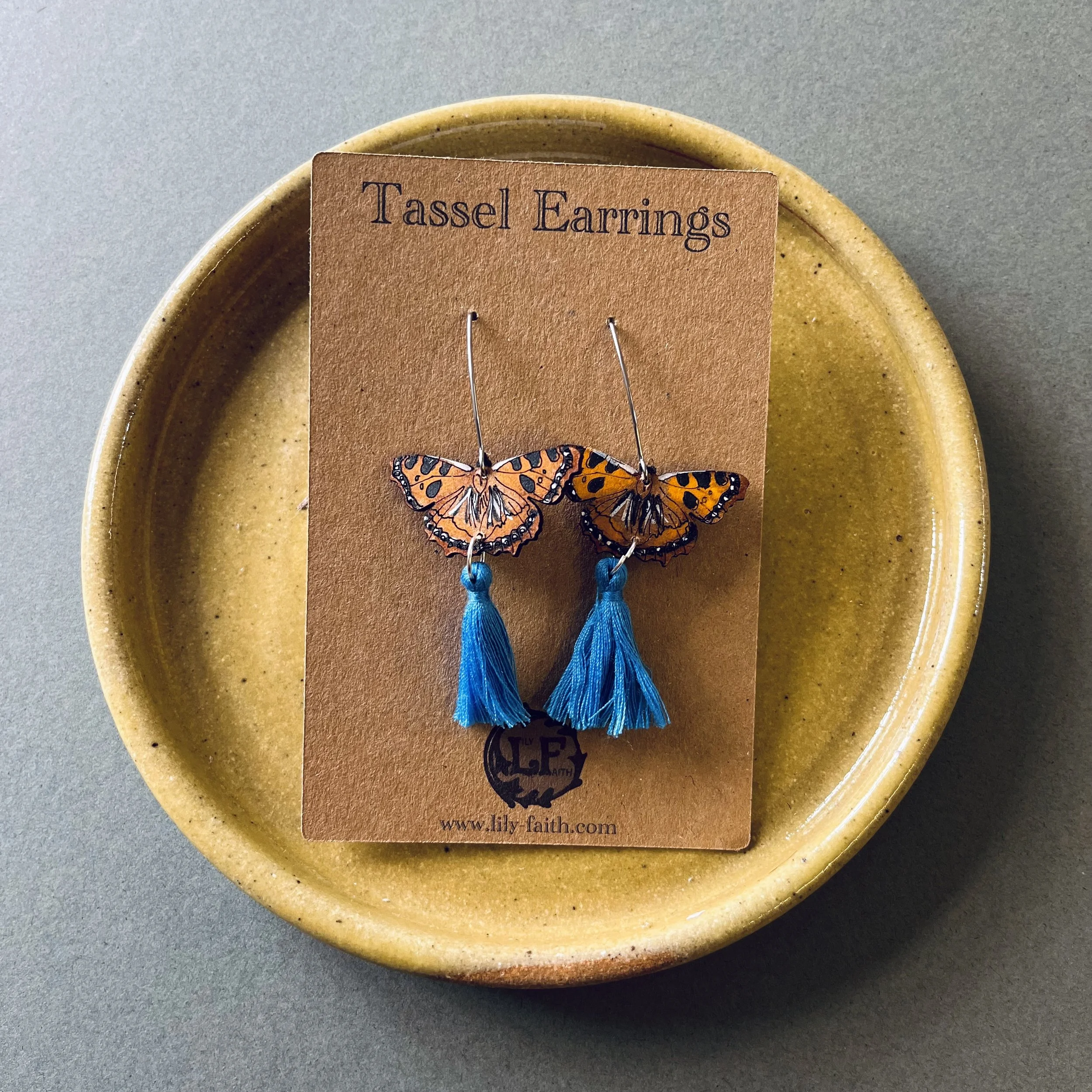 Tortoiseshell Butterfly Earrings with sky blue tassels