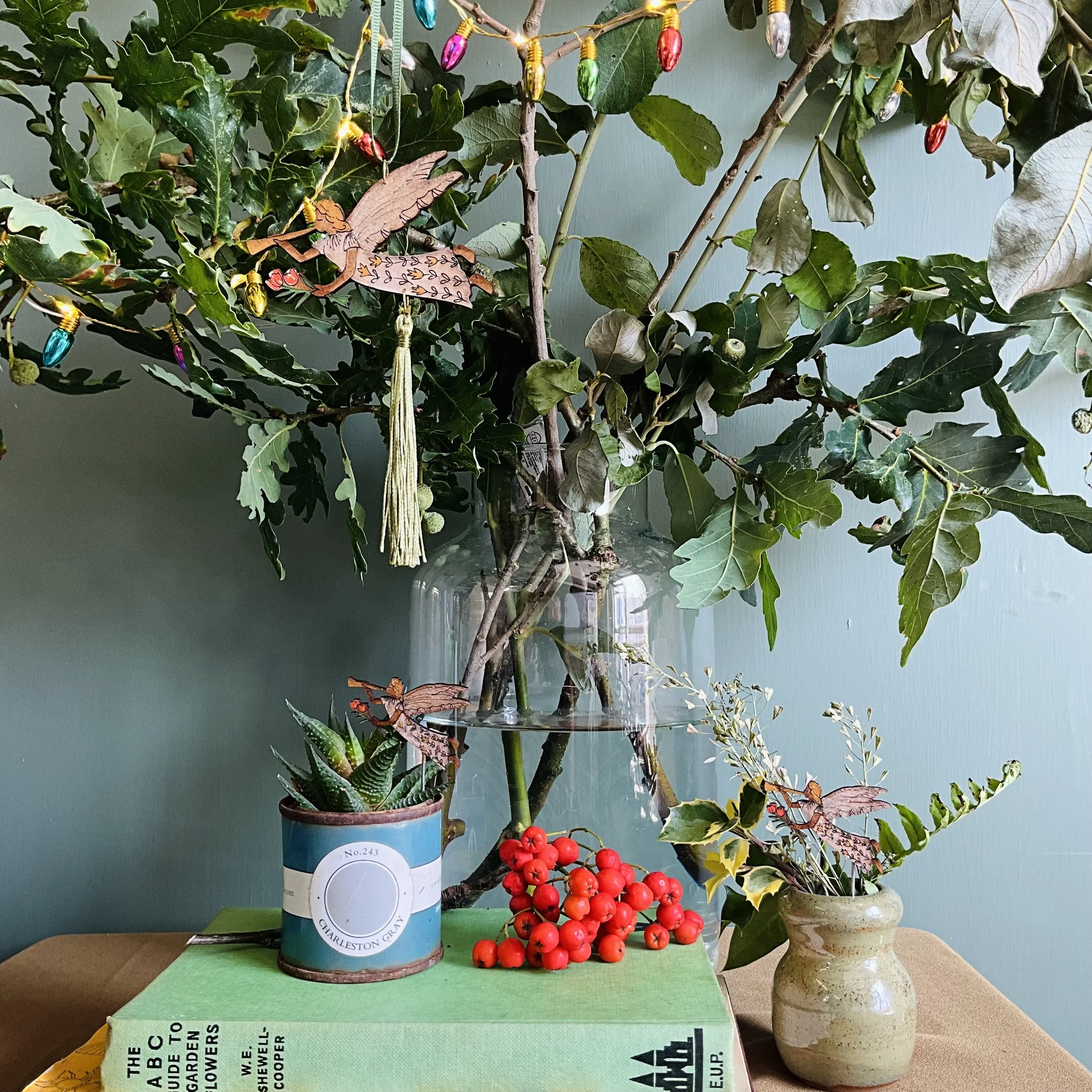 The Christmas Angel is available in both our tassel decorations and plant pot companions, giving you a joyful play on scale.