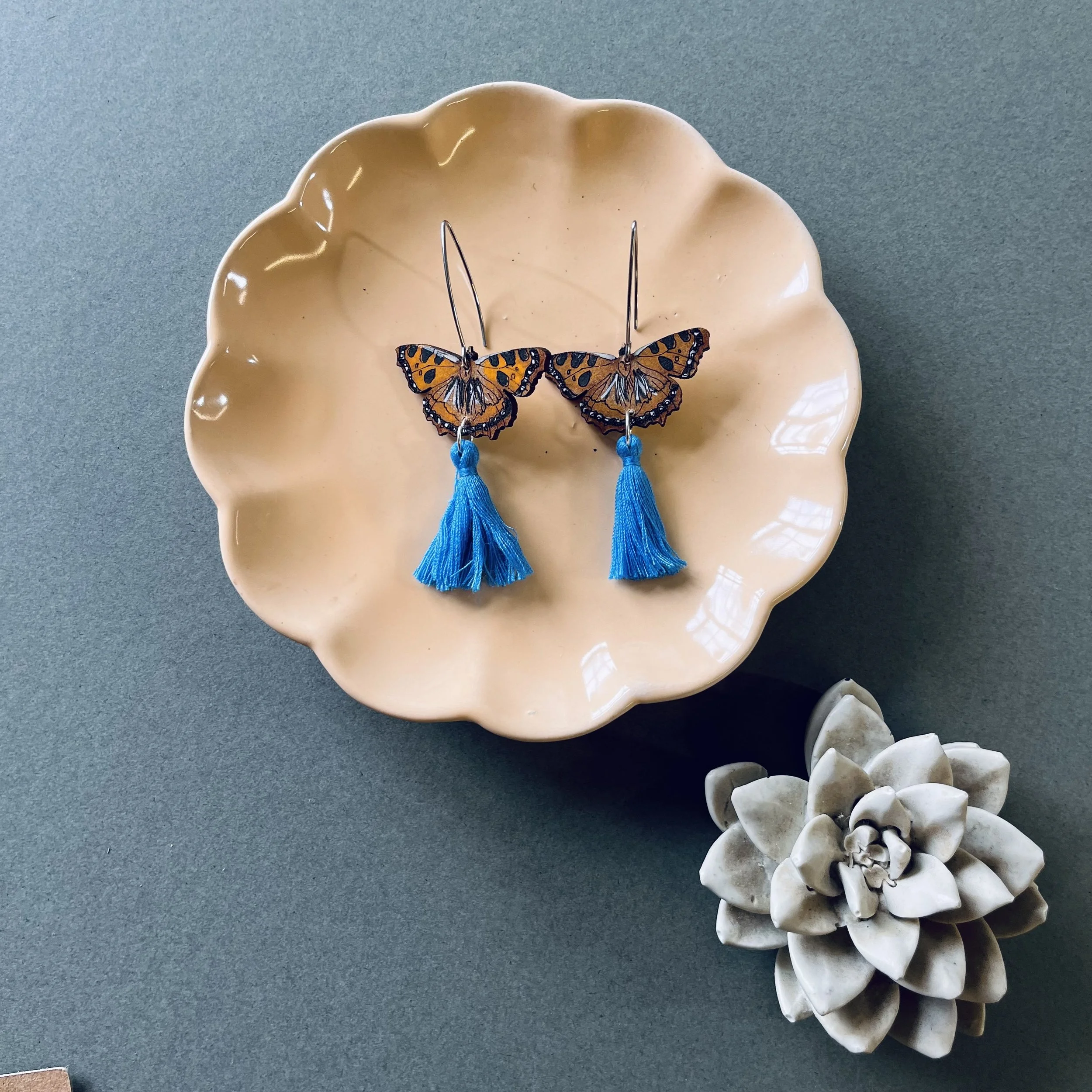 Tortoiseshell Butterfly Earrings with sky blue tassels