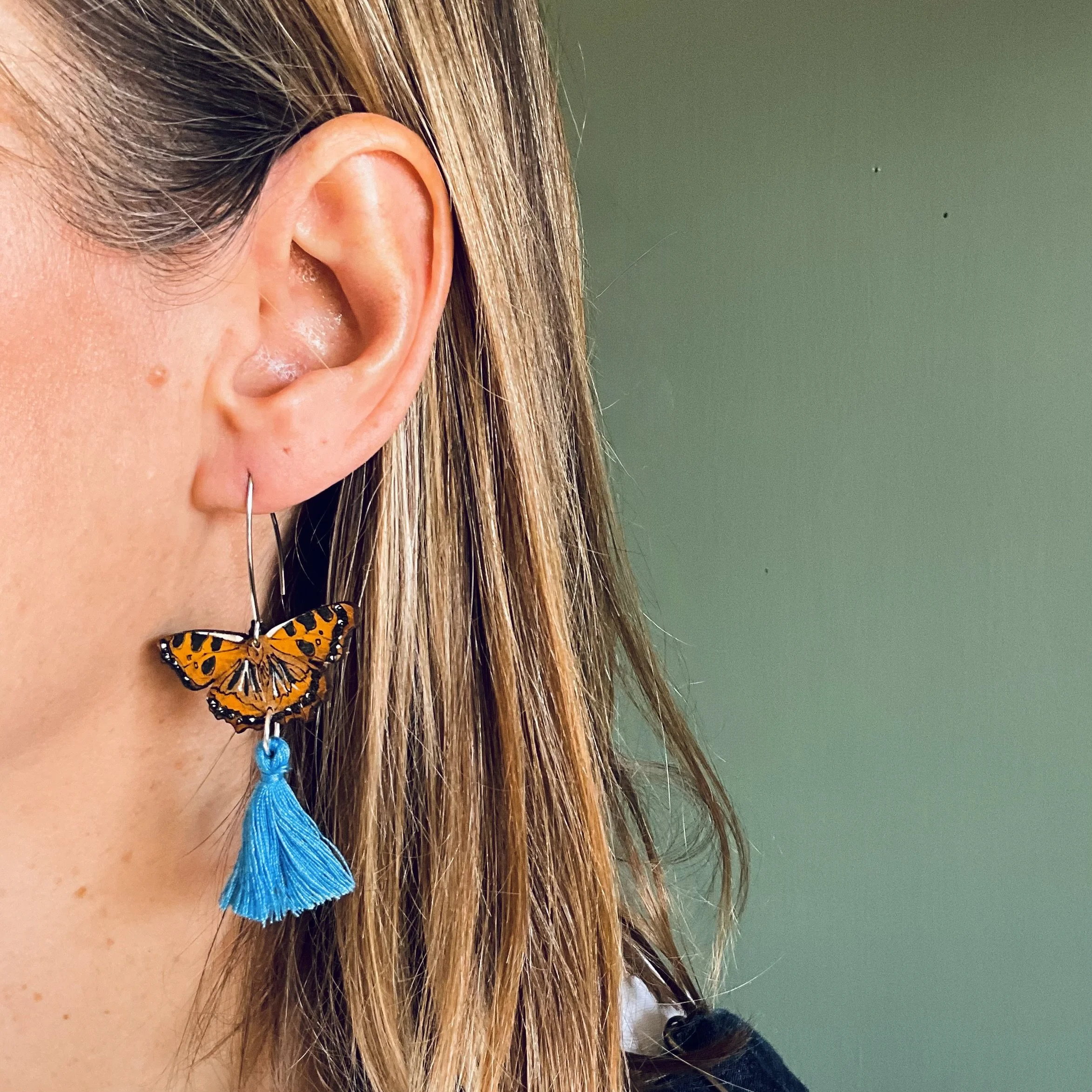 Tortoiseshell Butterfly Earrings with sky blue tassels