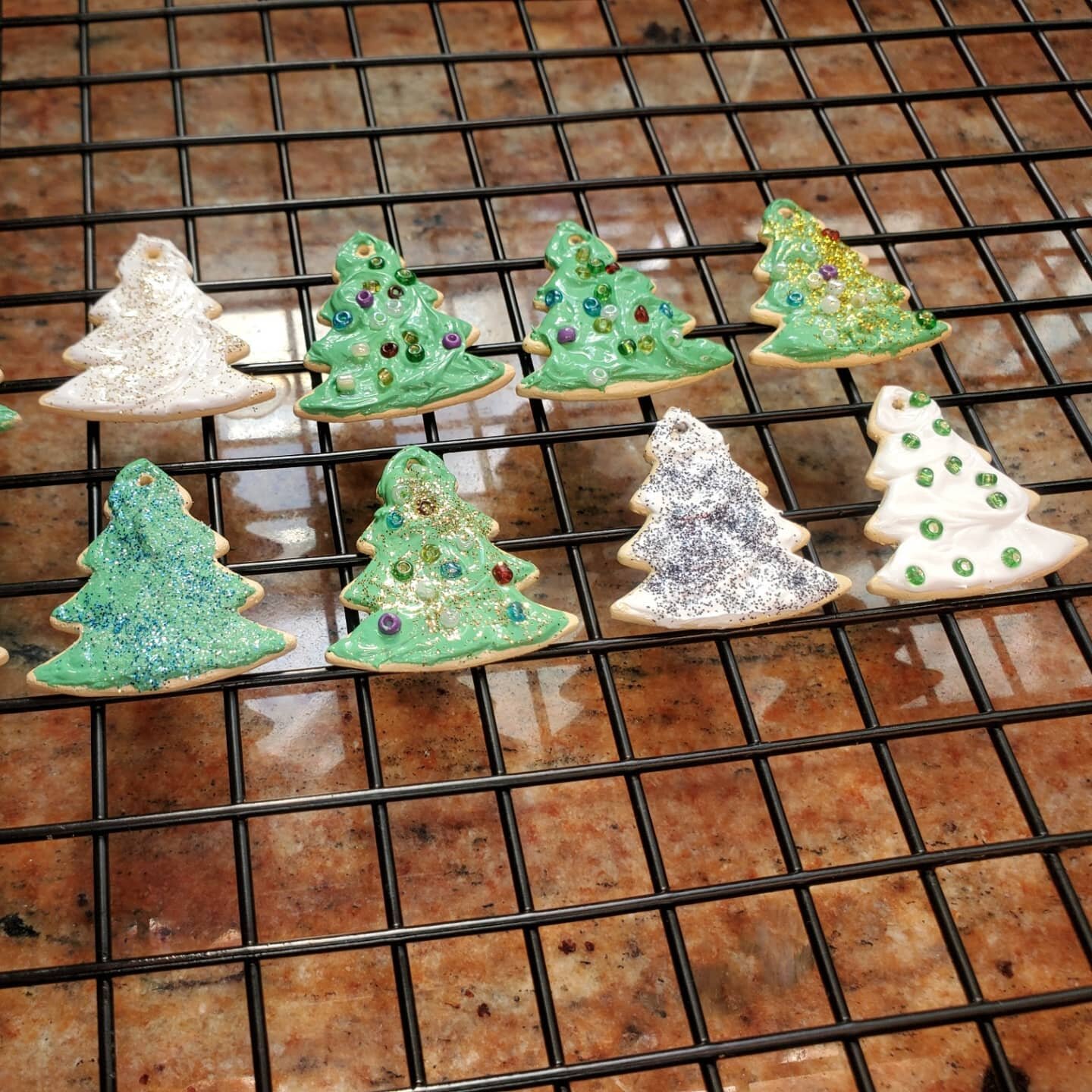 Christmas is here! I've been working on some sugar cookie Christmas charms lately. I haven't listed them on my Etsy yet so if anyone would like one, would like a custom icing and sprinkle color on a specific shape, just send me a message! I will be s