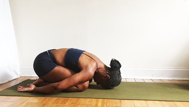 balasana. (child’s pose variation): round shoulders