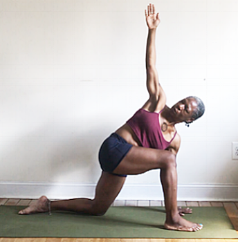 parivrtta anjaneyasana. (rotated crescent moon pose variation)
