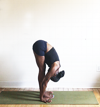 uttanasana. (deep forward fold pose).