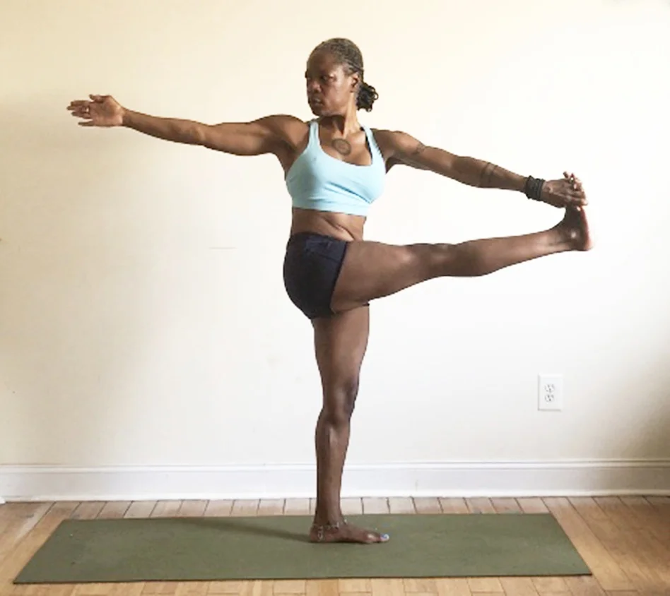 parivrtta hasta padangusthasana. (standing rotated hand to foot pose)