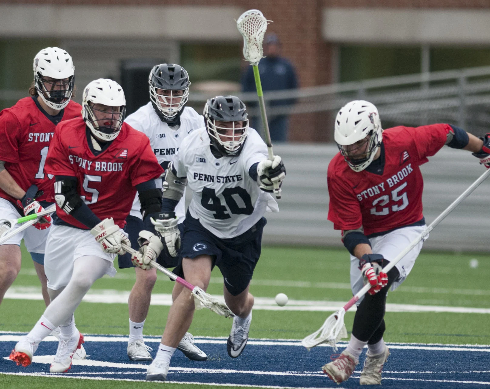 A group of players fight for possession of the ball at the Penn State v. Stony Brook men’s lacrosse game at Panzer Stadium on Saturday, Feb. 17, 2018. Penn State defeated Stony Brook 15-8.
