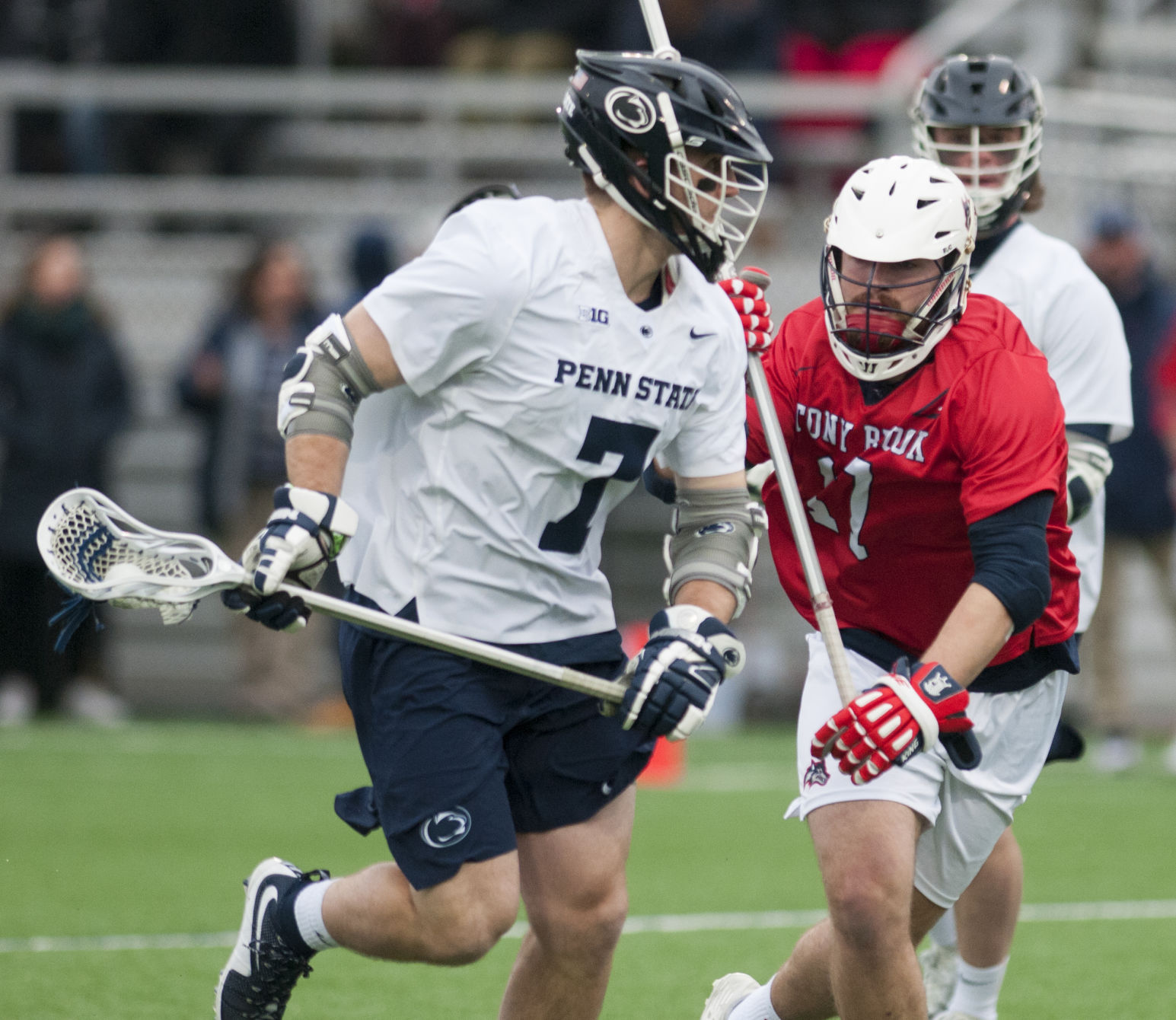Midfielder Tanner Peck (7) runs with the ball during the Penn State v. Stony Brook men’s lacrosse game at Panzer Stadium on Saturday, Feb. 17, 2018. Penn State defeated Stony Brook 15-8.