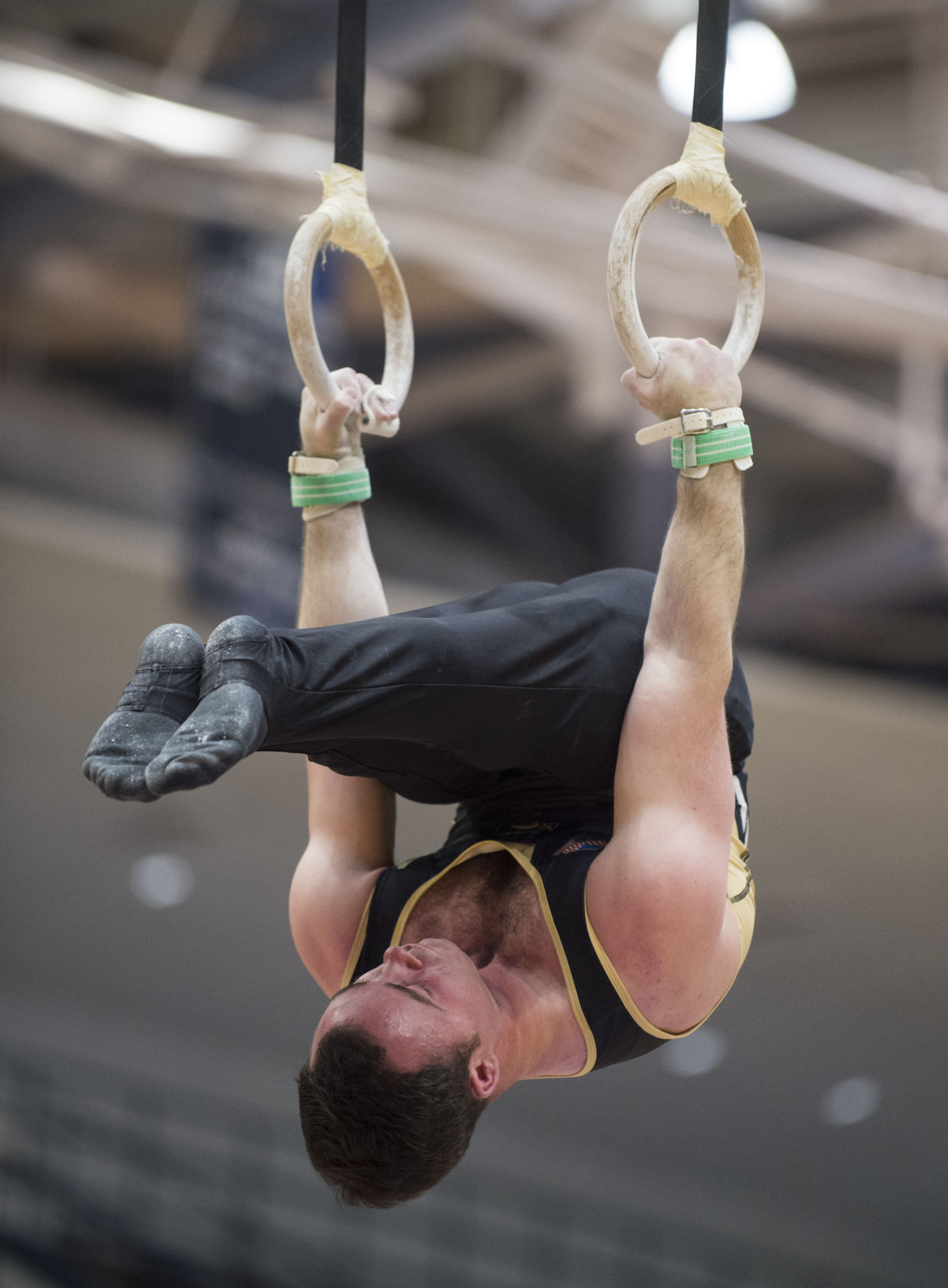 Army's Ryan Wilson performs on the rings in the men's gymnastics meet against Penn State in Rec Hall on Saturday, Jan. 20, 2018. Penn State defeated Army 407.600 - 384.100.
