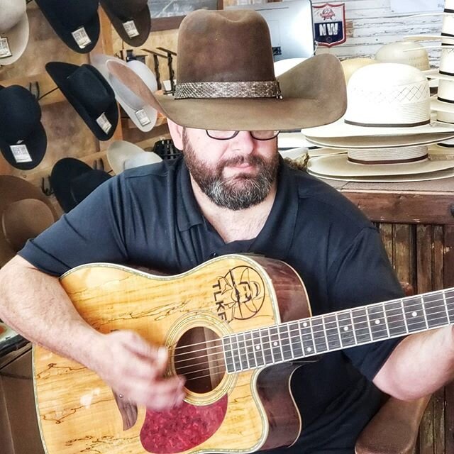 @clete_bradley of @cletebradleyandthemood picked up his medium distressed Pecan Eighter with rattlesnake band by @garrett.w.williams with a turkey and cockatiel feather combo. This hat was inspired by one of Cameron's down at @standardhatworks
