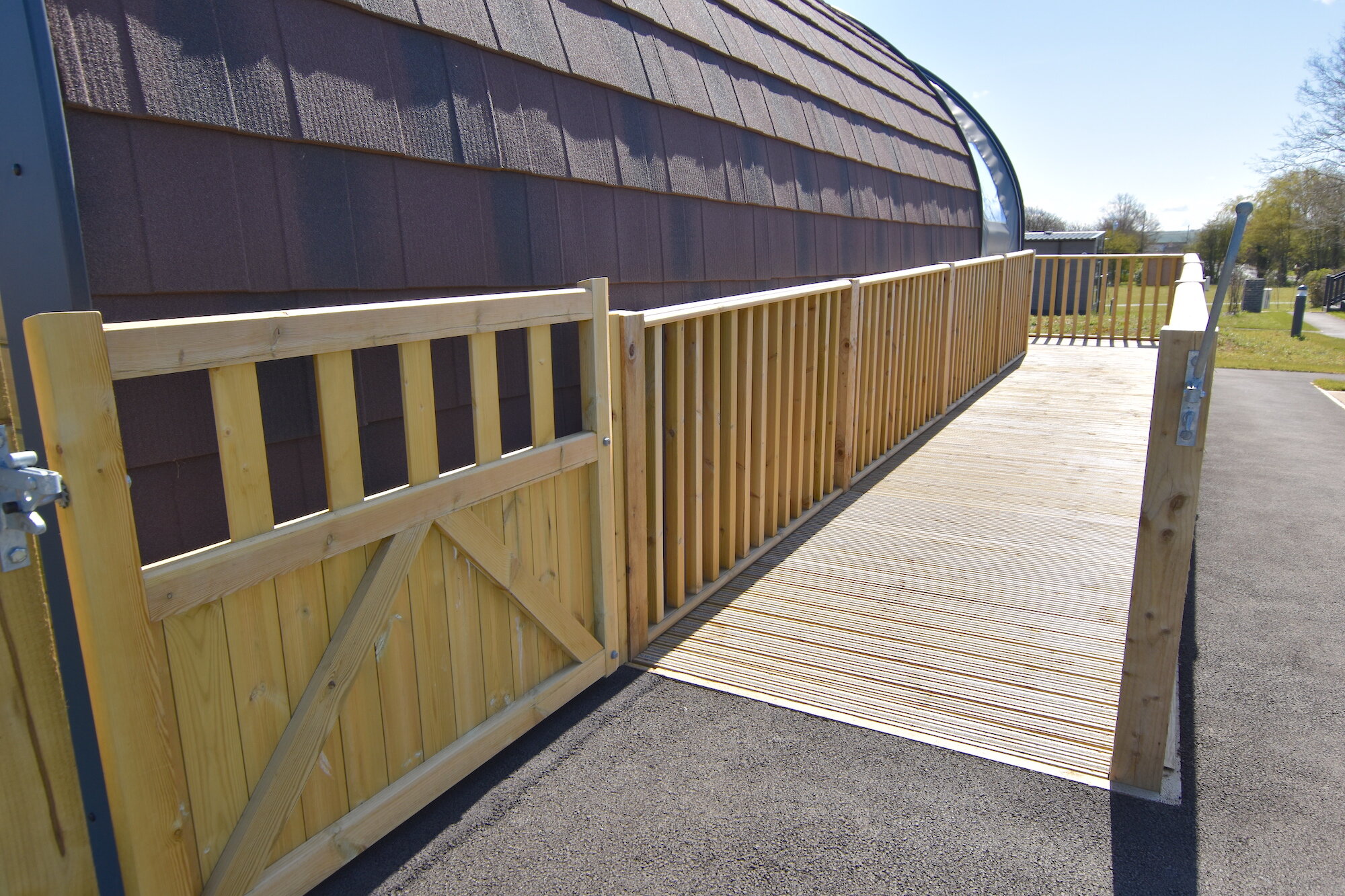 Ramp access to a wheelchair accessible glamping pod