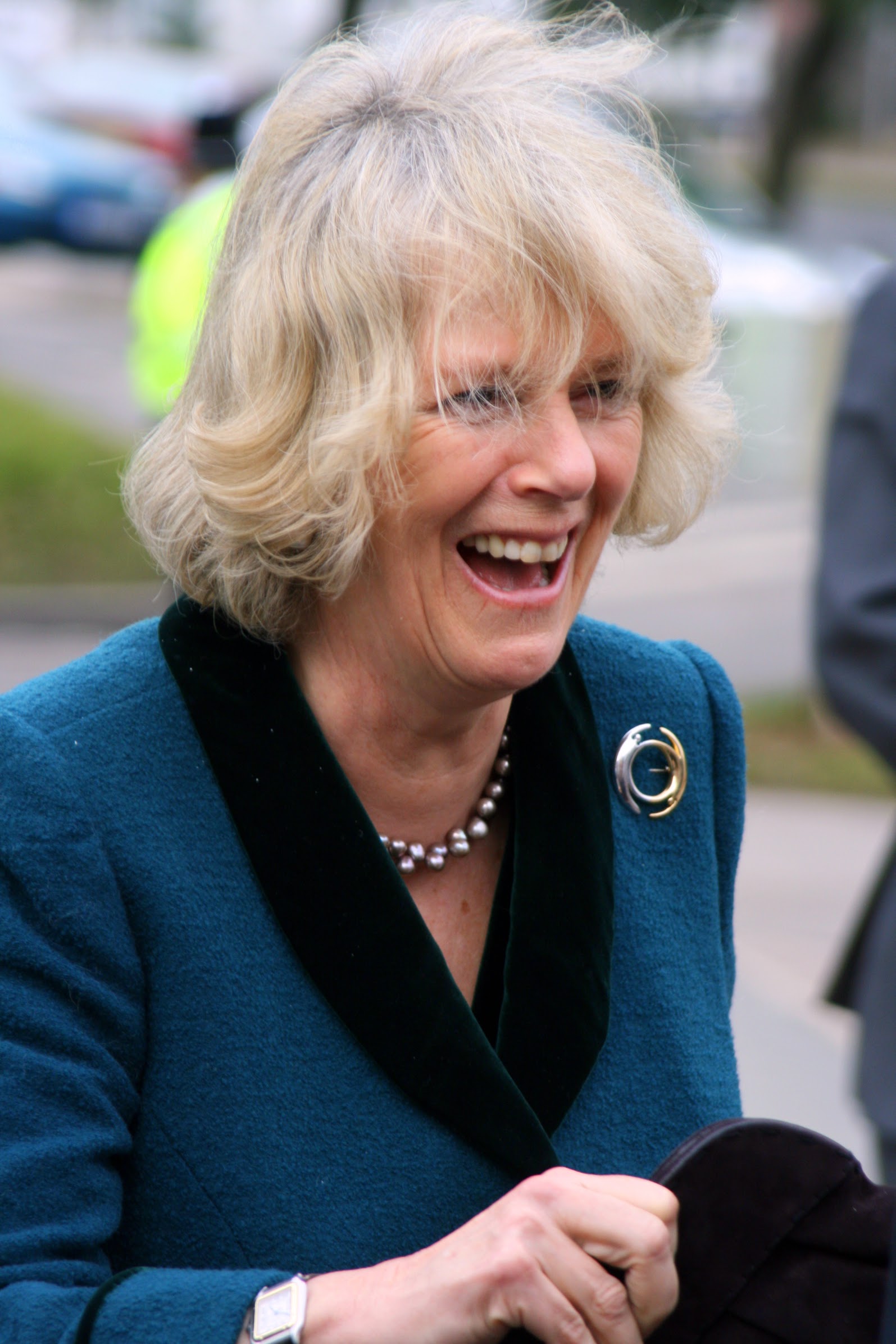  HRH The Duchess of Cornwall visits Rotherham General Hospital. The Duchess had entrusted an Aide with her handbag, was getting in her car and remembered she had forgot it, and burst out laughing when the Lord Lieutenant joked there'd been a theft! -