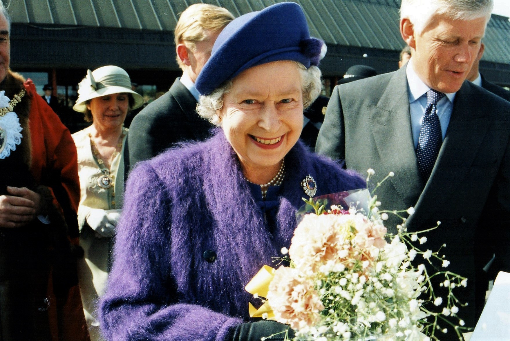  HM The Queen on a walkabout outside Crewe Railway Station. I just pressed the camera shutter button at the right moment and got what looks like a posed photo!!! - Date: June 1995. Photographer: Paul Ratcliffe 