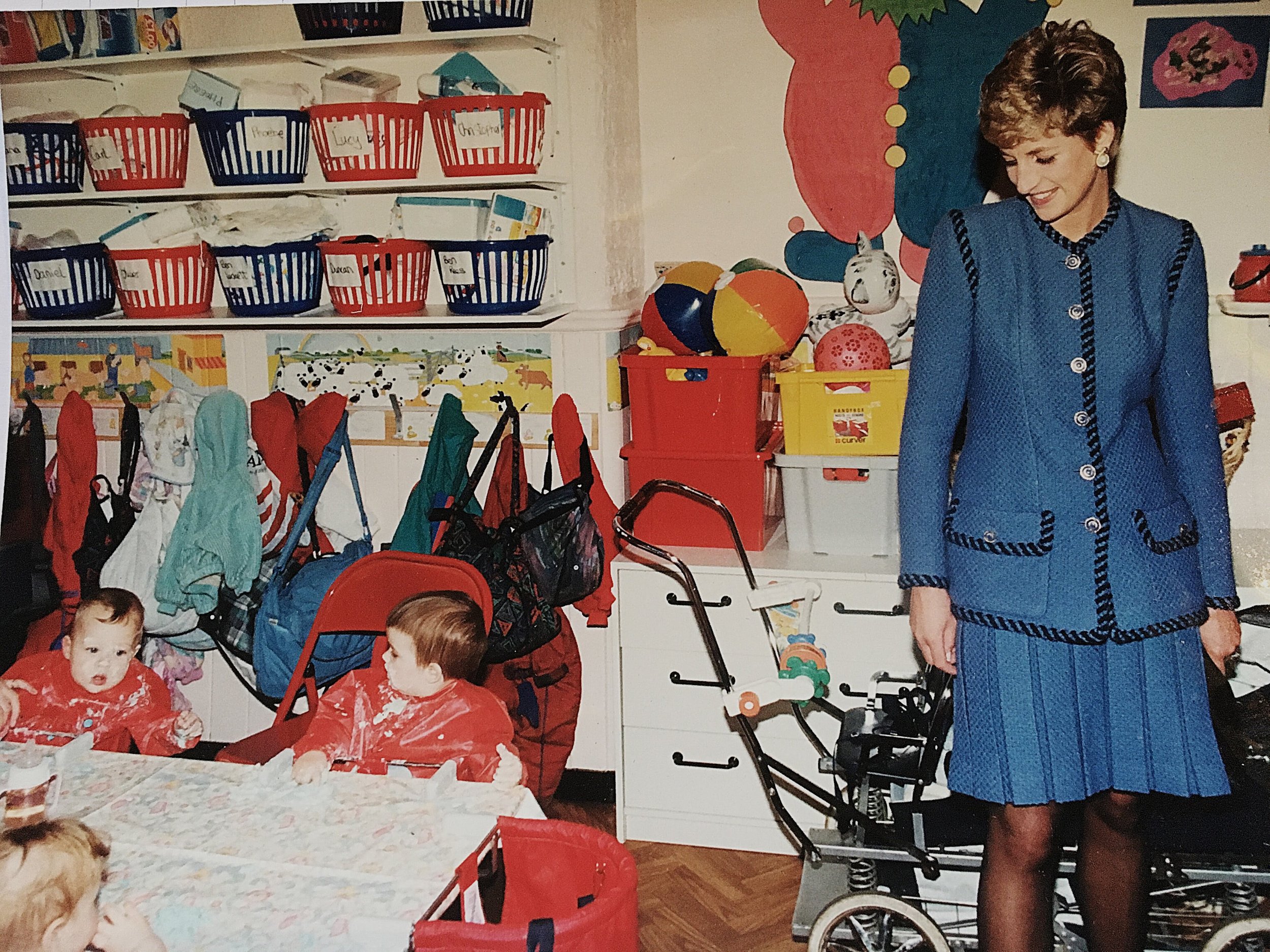  Princess Diana was visiting my daughter’s nursery in SW14. My daughter is the one on the end of the table looking at her friend as though to say ‘who did you say this was?’ (she is about 6 months old in the picture) Princess Diana was very amused at