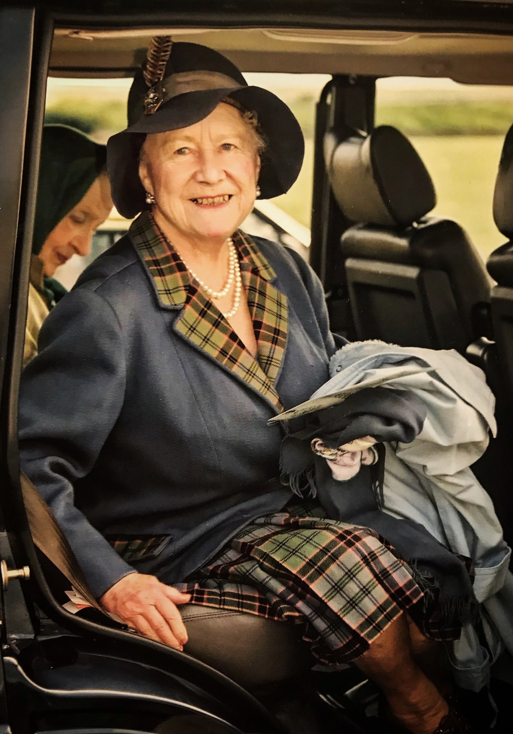  This was taken whilst the Queen Mother was on holiday at the Castle of Mey in August, 1992. She had turned up to watch the local sheep dog trials and support the event. As ever she was a dream to photograph, turning in her car seat to ensure l got t