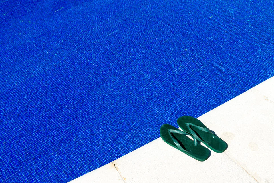 swimming-pool-with-flip-flops-P2KFAC5.jpg