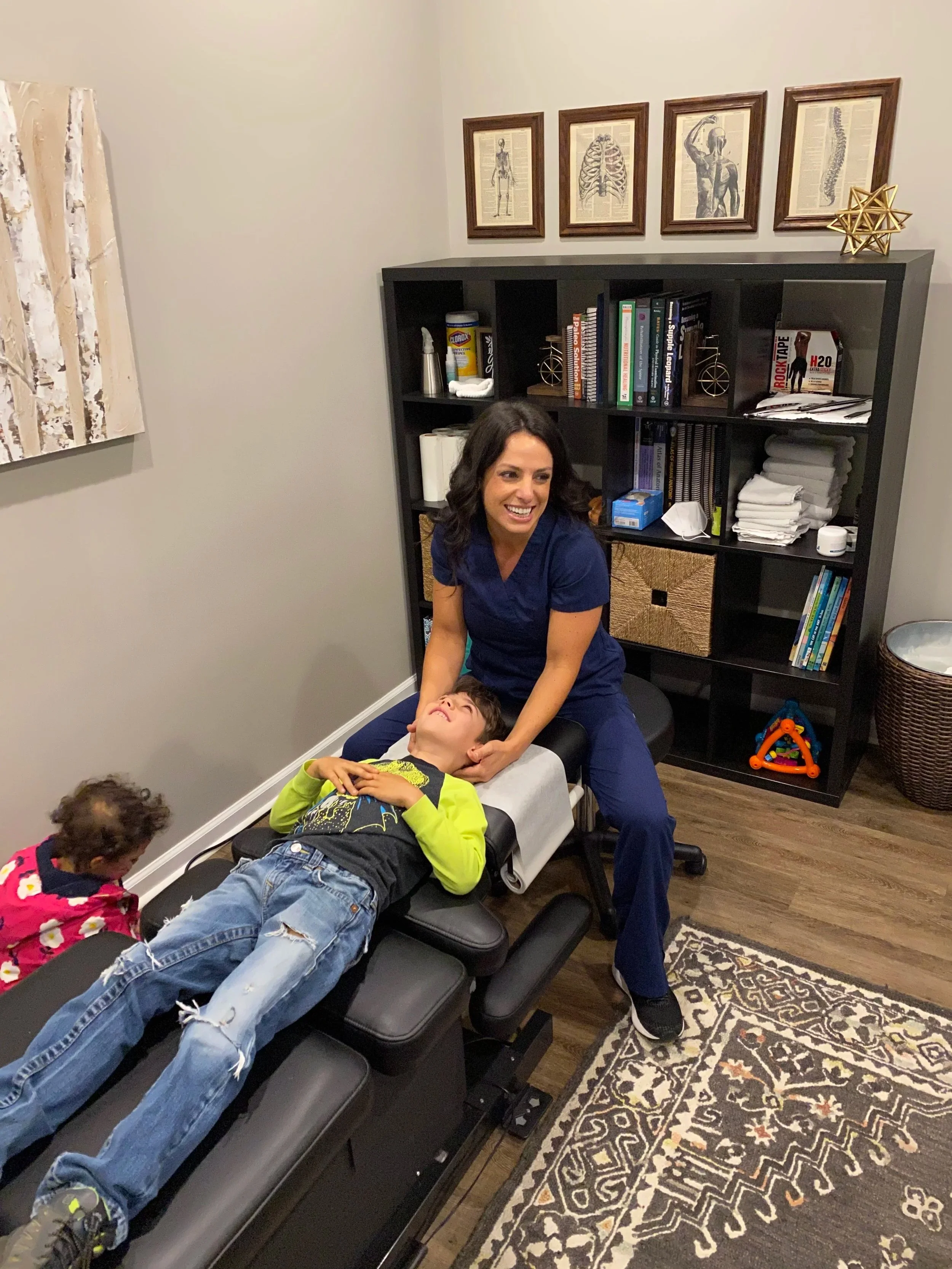Child receiving gentle chiropractic care in Hendersonville NC
