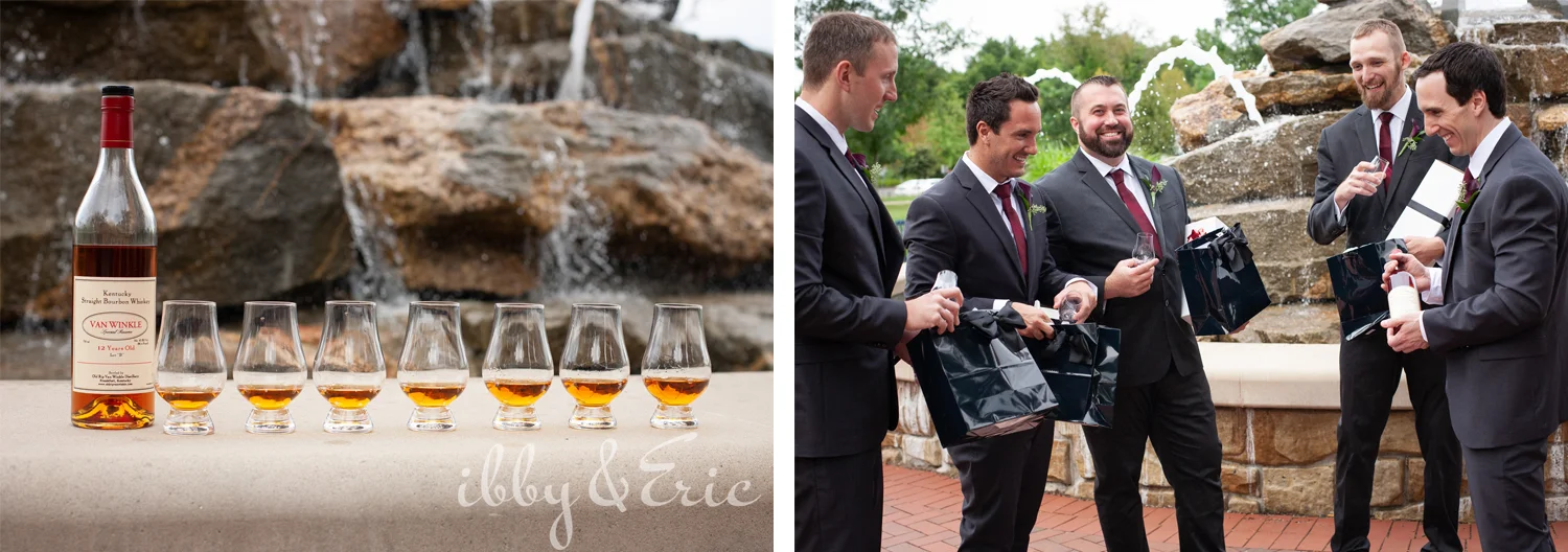 A groom gifts whiskey decanters to his happy groomsmen while they stand in front of a rock fountain.