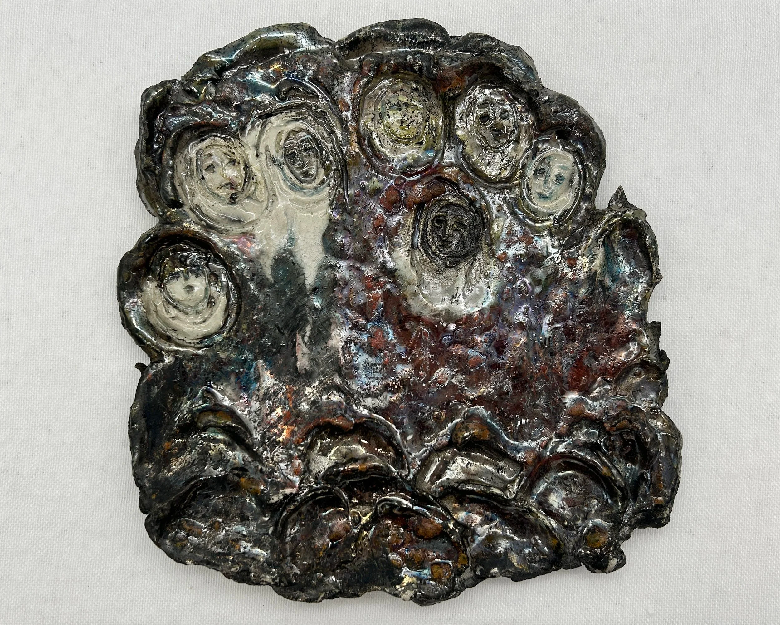 Carol Taylor 001, Angels Are Needed, 7 Faces, Choir, 2024, 6” x 6” Raku, $650