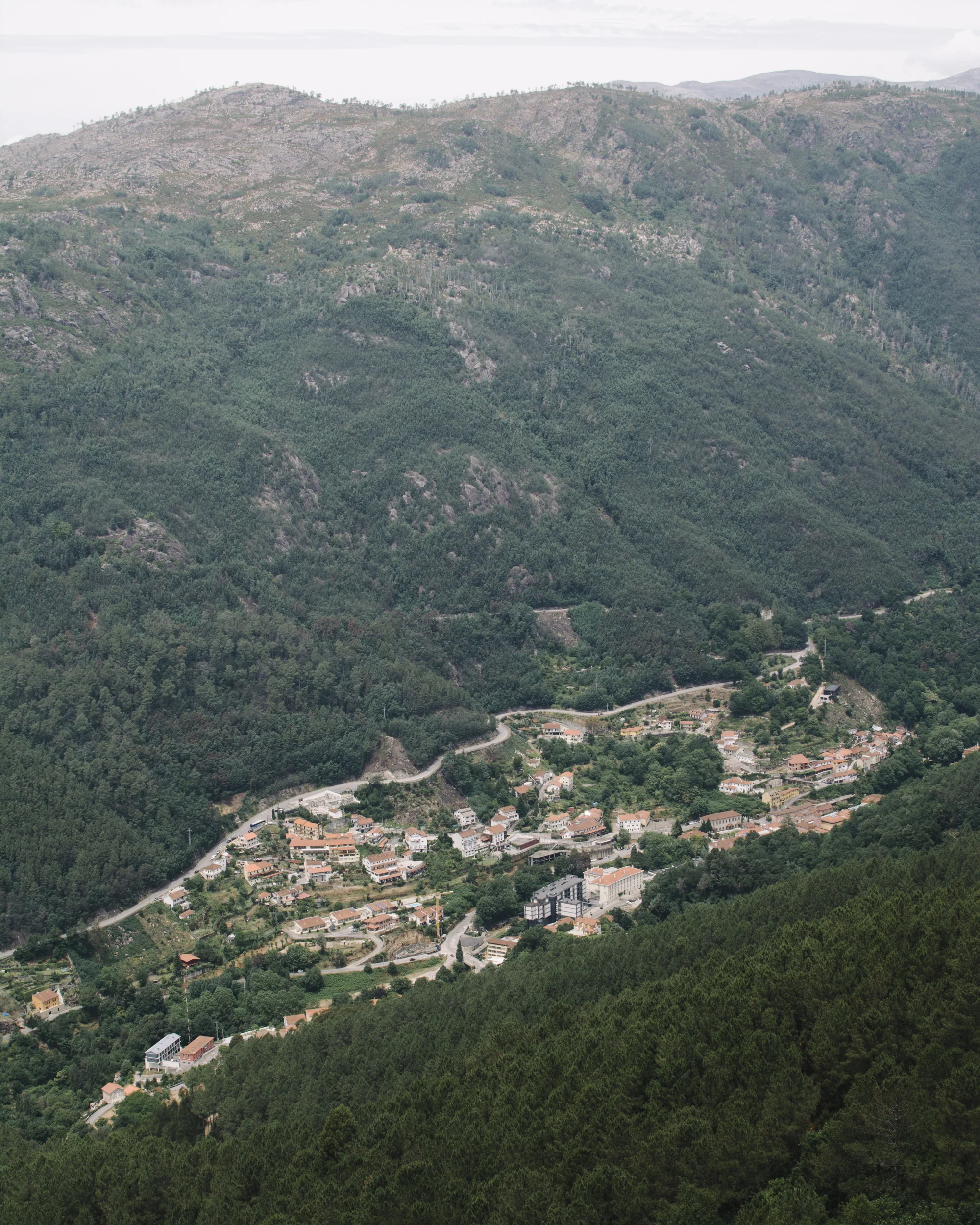 A typical cluster of houses amongst the vastness of the valley.