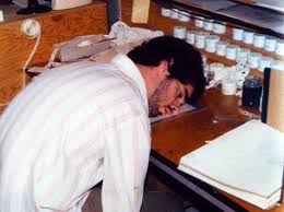  Pic of John sleeping at his animation desk in Don Bluth's garage during the production of "Banjo The Woodpile Cat" - circa 1978-79 