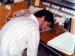 Pic of John sleeping at his animation desk in Don Bluth's garage during the production of "Banjo The Woodpile Cat" - circa 1978-79