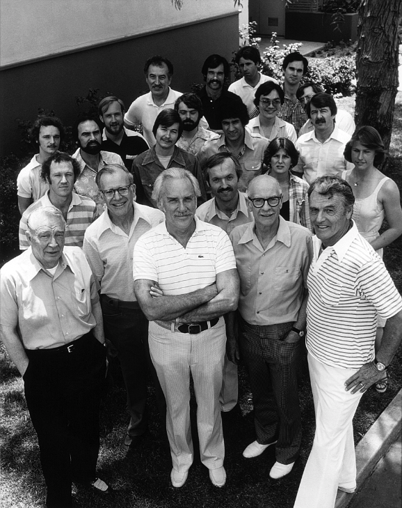 In the front row are Eric Larson, Frank Thomas, Art Stevens, Ollie Johnston, and Woolie Reitherman. That's me, in the back on the right in the checked shirt.