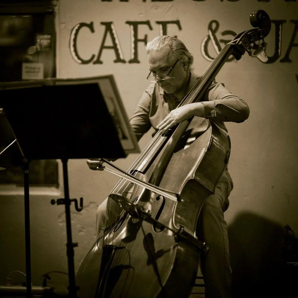 John playing bass. Photo: Robert Bonham Studios