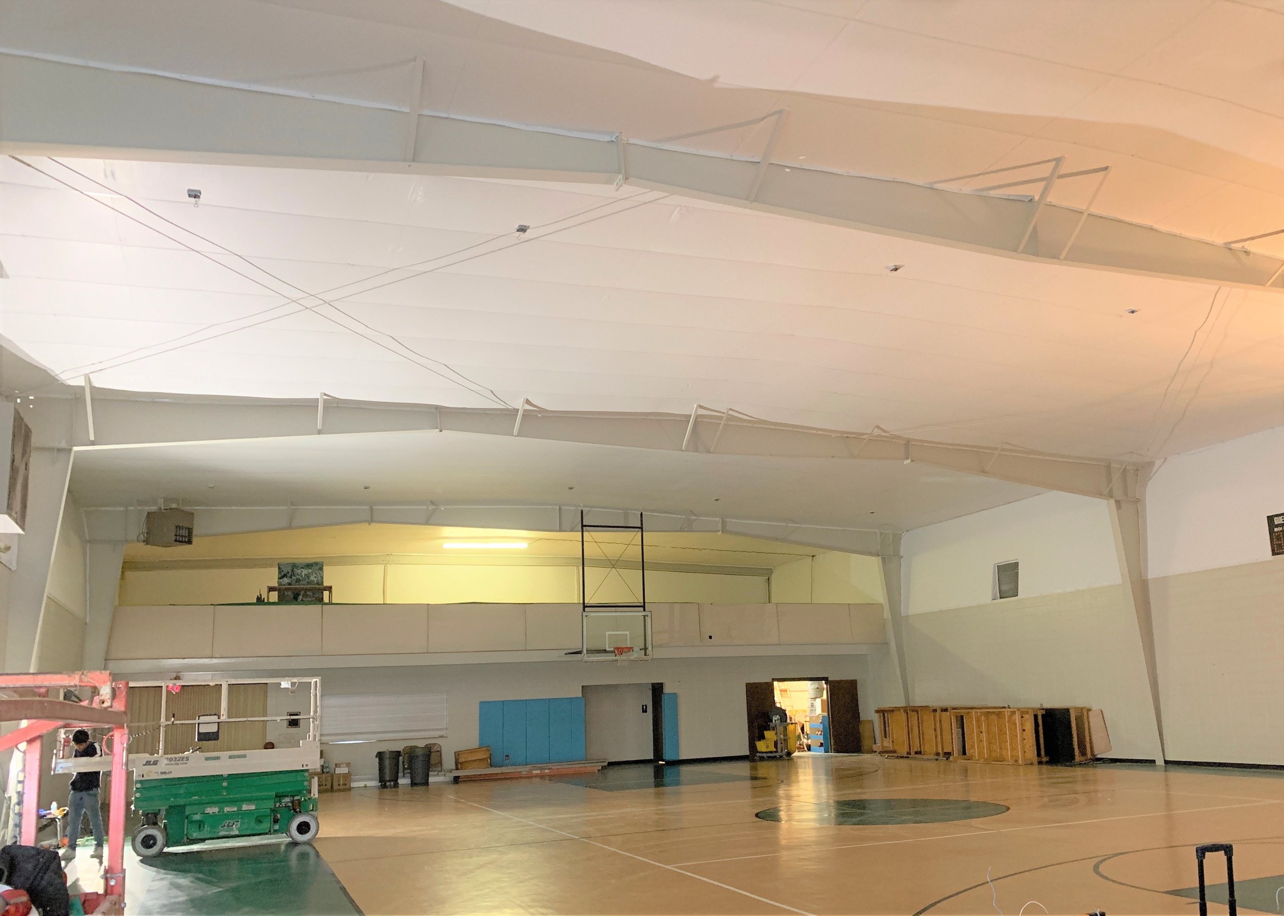 Our crew recently finished installing our reflective ceiling liner in the gymnasium area at St. Christopher’s Episcopal Church in Spartanburg, S.C. Check out how gorgeous it looks even before the light fixtures are rehung! This project was a referral from a builder we had worked with on a project many years ago and we were excited to be able to assist in making this gym area aesthetically more beautiful. Contact us to partner with you on your unique project!