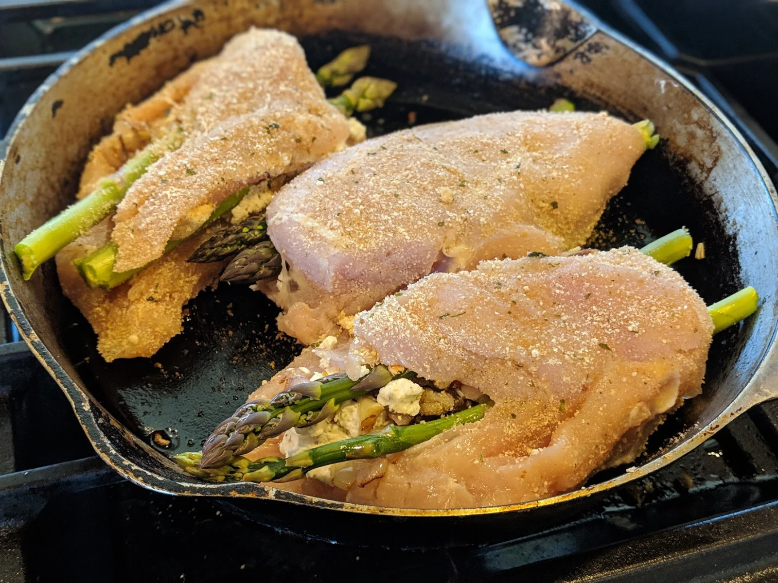 goat cheese stuffed chicken searing.jpg