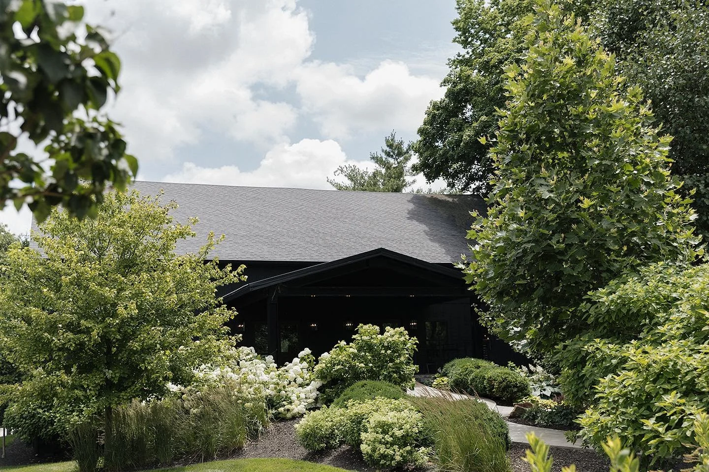 Lush gardens. Peak summer blooms. A stunning setting to celebrate your love.