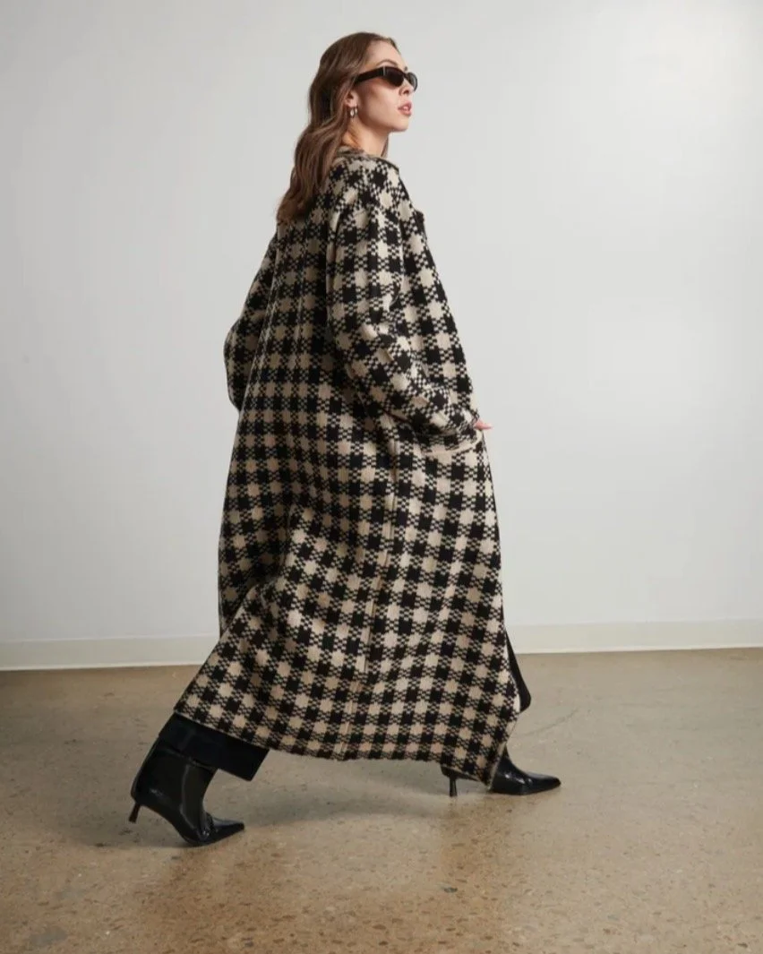 #RozSays did someone say they needed a black and cream buffalo plaid sweater coat? Because we have got a fabulous one from @linethelabelny and it does not disappoint!

#seeyouatcoco #cocoanexperience #uppermontclairnj #peace #love #fashion