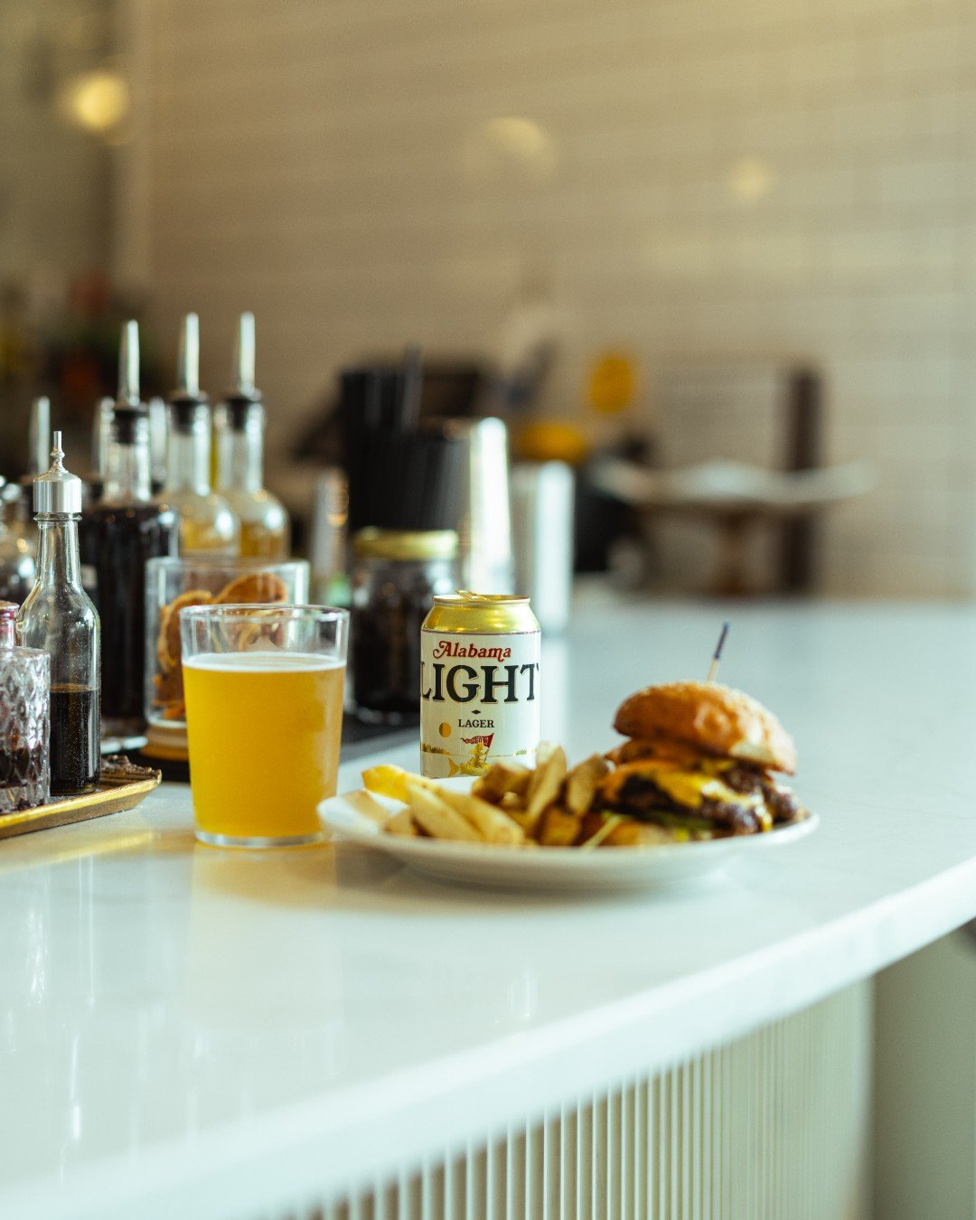 One bite, and you&rsquo;ll feel the fireworks. 🎆 The 4th of July was made for burgers, beer, and good company&mdash;we've got a $15 burger + Alabama Light special, dine-in only. Come celebrate with us from 11-3! 🍔🍻