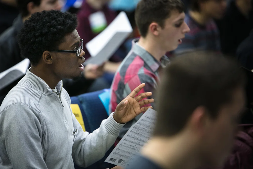 High school student in chorus rehearsal