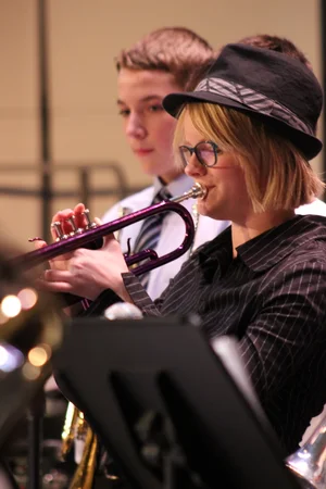 Student trumpet player in concert at a district festival